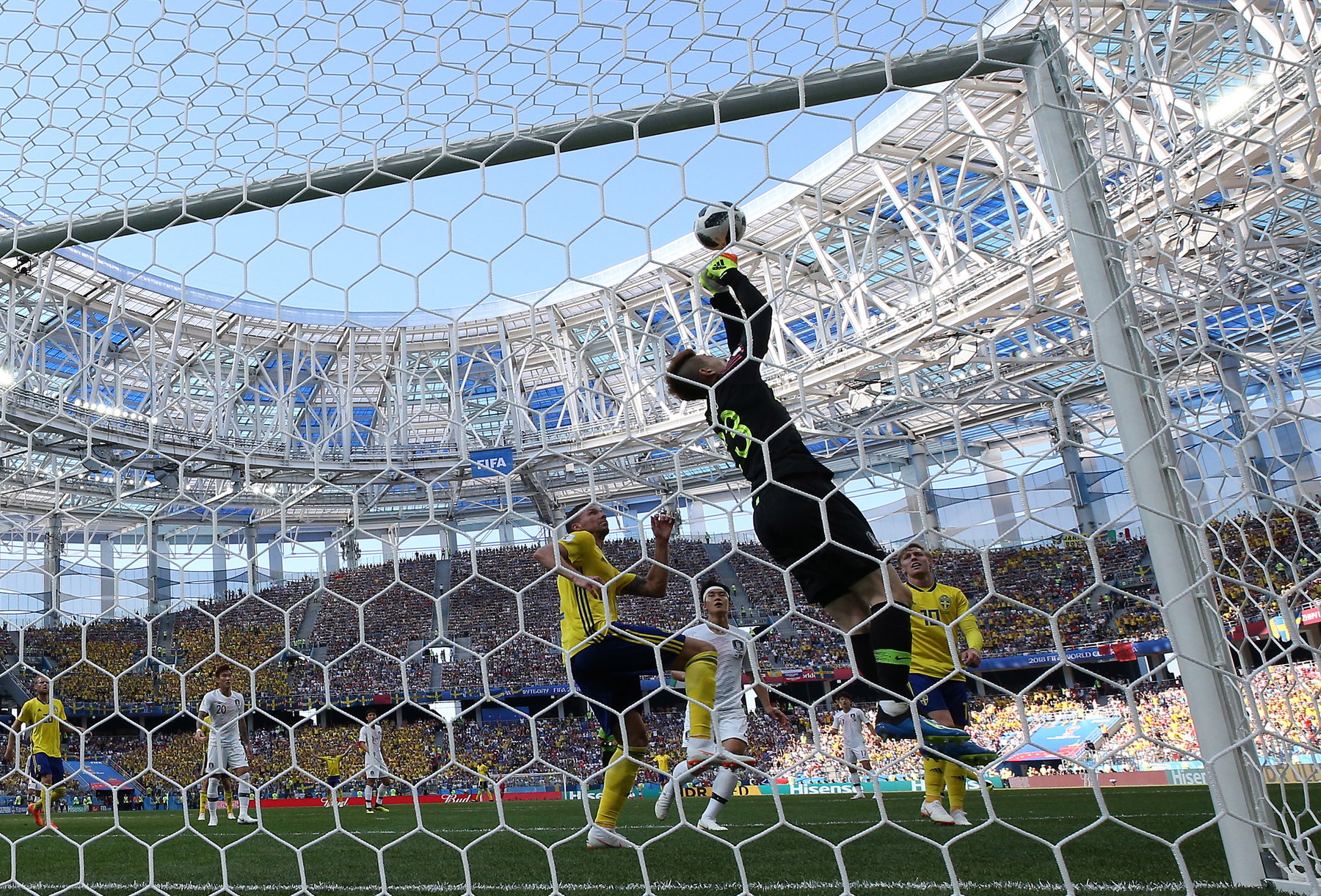 epa06818449 Goalkeeper Jo Hyeon-woo of South Korea in action the FIFA World Cup 2018 group F preliminary round soccer match between Sweden and South Korea in Nizhny Novgorod, Russia, 18 June 2018.

(RESTRICTIONS APPLY: Editorial Use Only, not used in association with any commercial entity - Images must not be used in any form of alert service or push service of any kind including via mobile alert services, downloads to mobile devices or MMS messaging - Images must appear as still images and must not emulate match action video footage - No alteration is made to, and no text or image is superimposed over, any published image which: (a) intentionally obscures or removes a sponsor identification image; or (b) adds or overlays the commercial identification of any third party which is not officially associated with the FIFA World Cup)  EPA/VASSIL DONEV   EDITORIAL USE ONLY  EDITORIAL USE ONLY