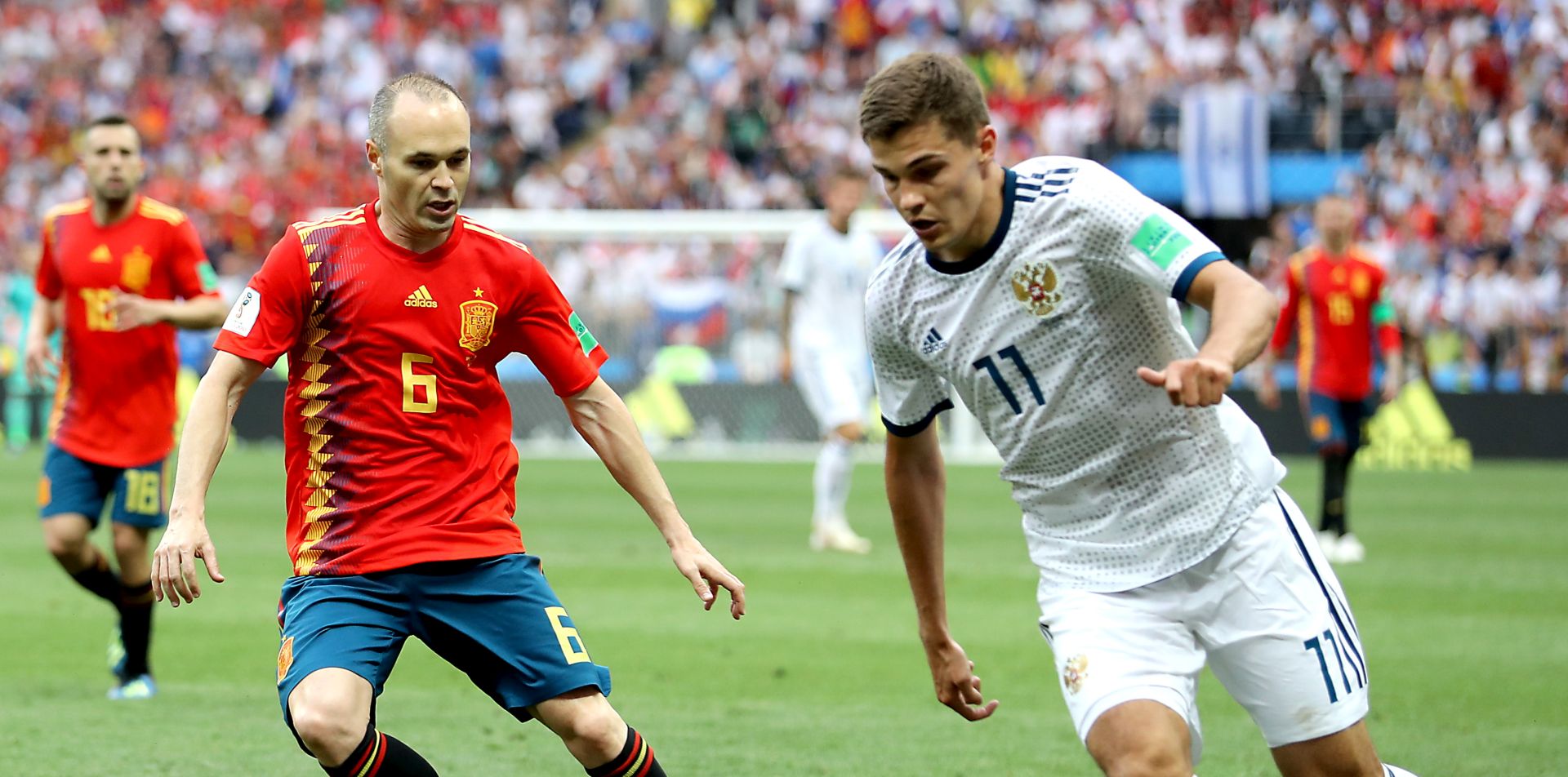 epa06855545 Roman Zobnin of Russia (R) and Andres Iniesta of Spain in action during the FIFA World Cup 2018 round of 16 soccer match between Spain and Russia in Moscow, Russia, 01 July 2018.

(RESTRICTIONS APPLY: Editorial Use Only, not used in association with any commercial entity - Images must not be used in any form of alert service or push service of any kind including via mobile alert services, downloads to mobile devices or MMS messaging - Images must appear as still images and must not emulate match action video footage - No alteration is made to, and no text or image is superimposed over, any published image which: (a) intentionally obscures or removes a sponsor identification image; or (b) adds or overlays the commercial identification of any third party which is not officially associated with the FIFA World Cup)  EPA/MAHMOUD KHALED EDITORIAL USE ONLY  EDITORIAL USE ONLY
