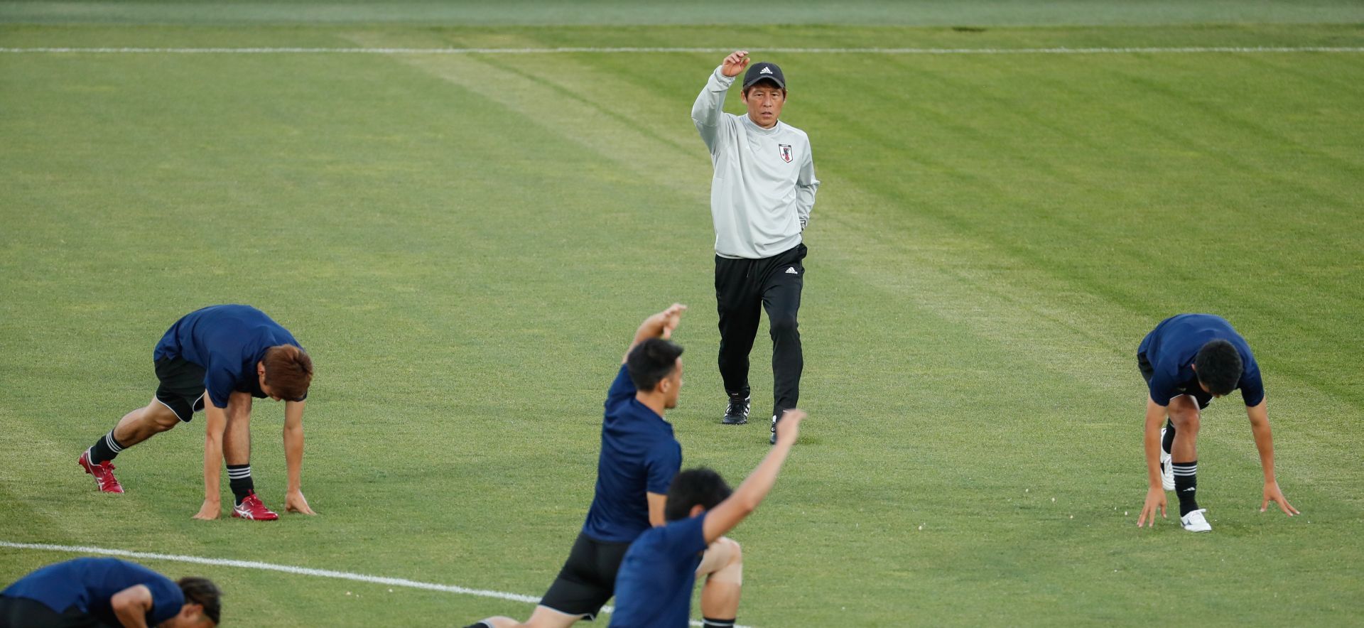 epa06856366 Japanese head coach Akira Nishino (top) with players attend a training session in Rostov-on-Don, Russia, 01 July 2018. Belgium will face Japan in the FIFA World Cup 2018 round of 16 soccer match on 02 July 2018.  EPA/ROMAN PILIPEY