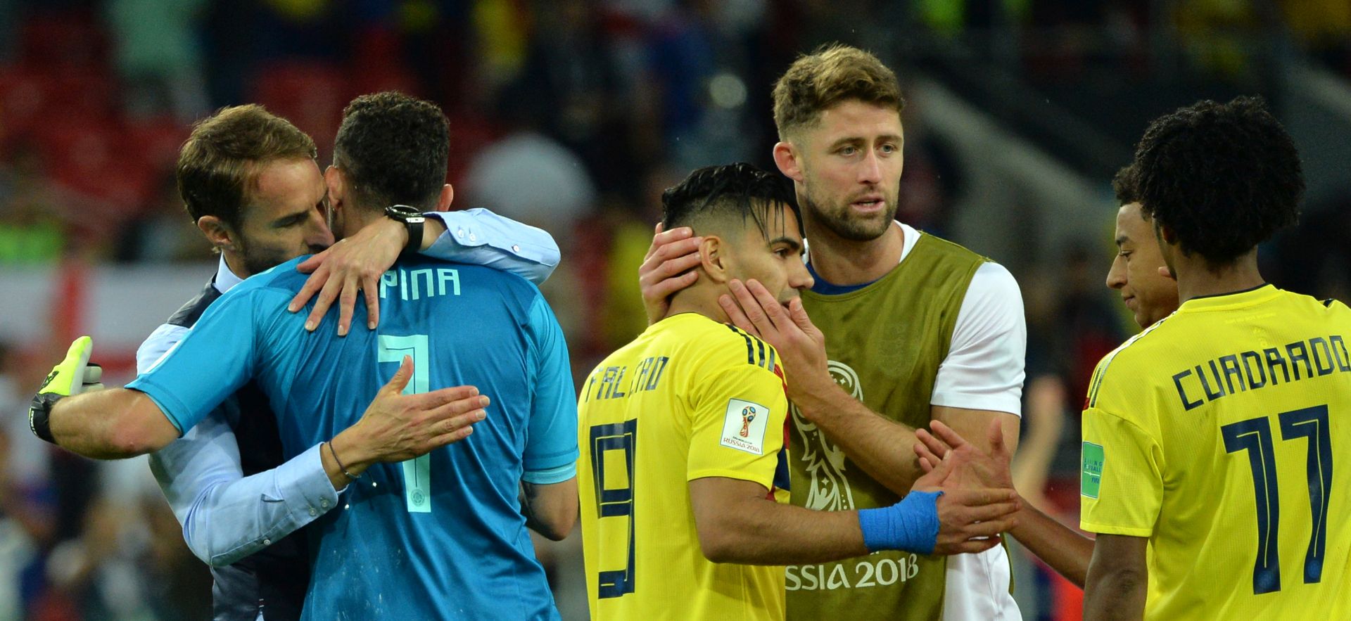 epa06862575 England's manager Gareth Southgate (L) comforts Goalkeeper David Ospina of Colombia after the penalty shootout of the FIFA World Cup 2018 round of 16 soccer match between Colombia and England in Moscow, Russia, 03 July 2018.

(RESTRICTIONS APPLY: Editorial Use Only, not used in association with any commercial entity - Images must not be used in any form of alert service or push service of any kind including via mobile alert services, downloads to mobile devices or MMS messaging - Images must appear as still images and must not emulate match action video footage - No alteration is made to, and no text or image is superimposed over, any published image which: (a) intentionally obscures or removes a sponsor identification image; or (b) adds or overlays the commercial identification of any third party which is not officially associated with the FIFA World Cup)  EPA/PETER POWELL   EDITORIAL USE ONLY