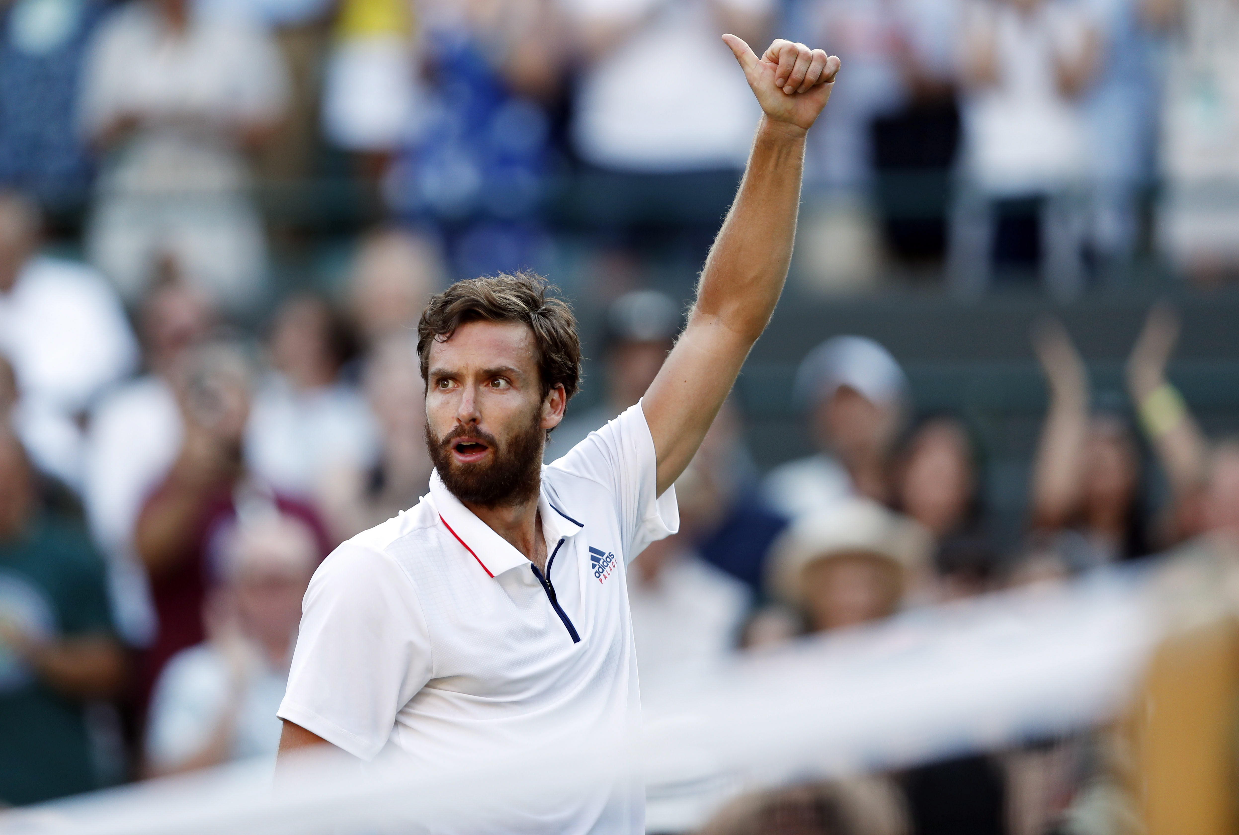 epa06872148 Ernests Gulbis of Latvia celebrates his win over Alexander Zverev of Germany in their third round match during the Wimbledon Championships at the All England Lawn Tennis Club, in London, Britain, 07 July 2018. EPA/NIC BOTHMA EDITORIAL USE ONLY/NO COMMERCIAL SALES