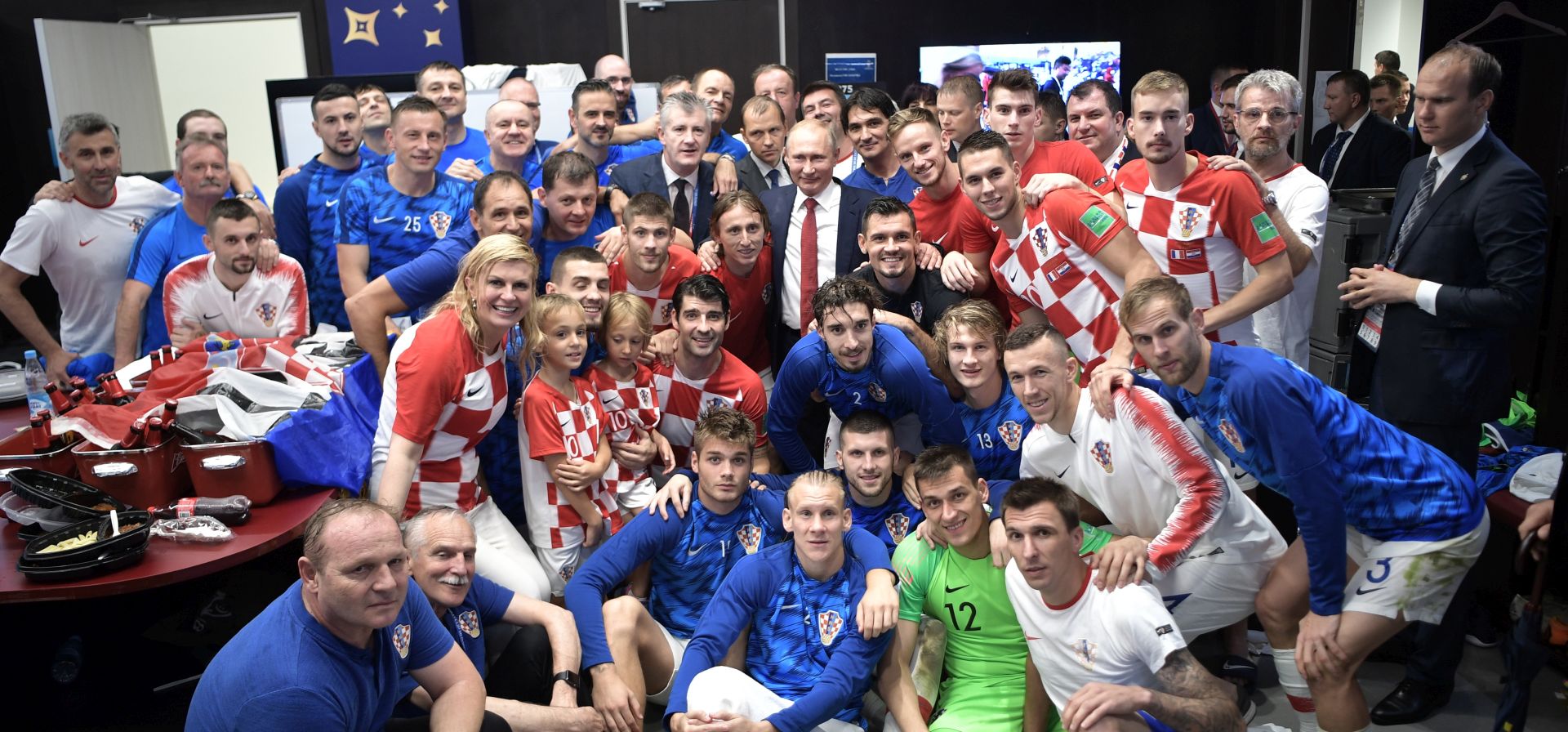 epa06892011 Croatian President Kolinda Grabar-Kitarovic and Russian President Vladimir Putin pose for a picture with Crotian soccer team after the FIFA World Cup 2018 final between France and Croatia in Moscow, Russia, 15 July 2018.

(RESTRICTIONS APPLY: Editorial Use Only, not used in association with any commercial entity - Images must not be used in any form of alert service or push service of any kind including via mobile alert services, downloads to mobile devices or MMS messaging - Images must appear as still images and must not emulate match action video footage - No alteration is made to, and no text or image is superimposed over, any published image which: (a) intentionally obscures or removes a sponsor identification image; or (b) adds or overlays the commercial identification of any third party which is not officially associated with the FIFA World Cup)  EPA/ALEXEI NIKOLSKY / SPUTNIK  / KREMLIN POOL / POOL MANDATORY CREDIT