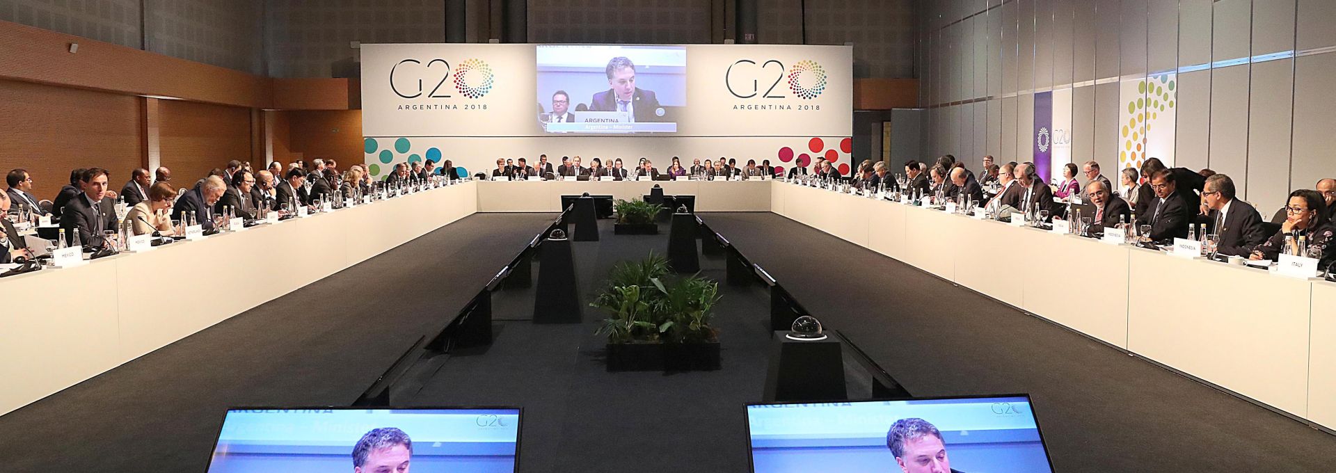 epa06903236 A handout photo made available by the G20 shows Argentinian Minister of Finance Nicholas Dujovne (on screen), participating in a meeting of finance ministers and the governors of the Central Banks of the G20 countries, in Buenos Aires, Argentina, 21 July 2018. The Finance Ministers and the Governors of the Central Banks of the G20 countries began today a meeting in Buenos Aires in which they will debate on the future of work and infrastructure for development, defined priorities of Argentina, which holds the annual presidency of the G20.  EPA/G20 / HANDOUT  HANDOUT EDITORIAL USE ONLY/NO SALES