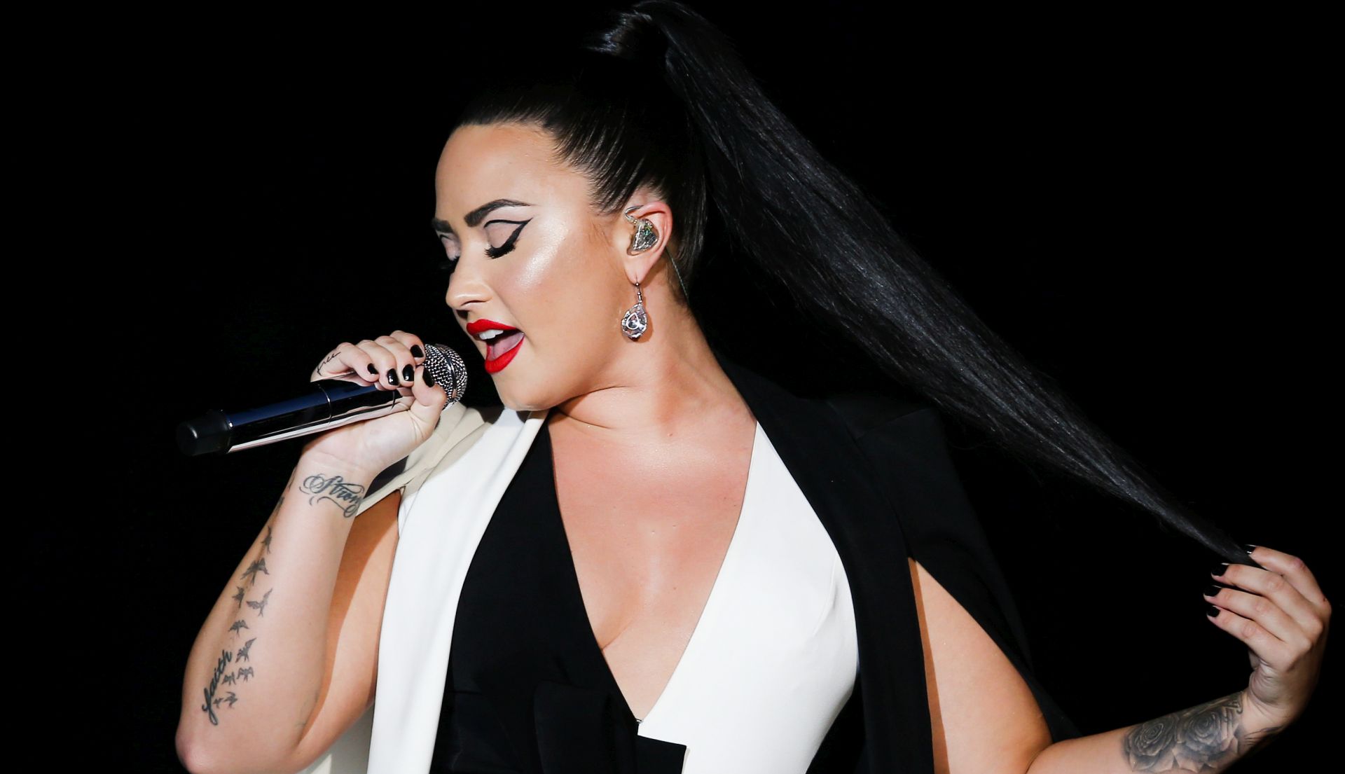 epa06908640 (FILE) US singer and composer Demi Lovato performs in concert at the World Stage during the 8th edition of Rock in Rio Lisbon, at Parque da Bela Vista in Lisbon, Portugal, 24 June 2018 (reissued 24 July 2018). According to media reports on 24 July 2018, US singer Demi Lovato has been hospitalized in Los Angeles following a suspected overdose.  EPA/JOSE SENA GOULAO