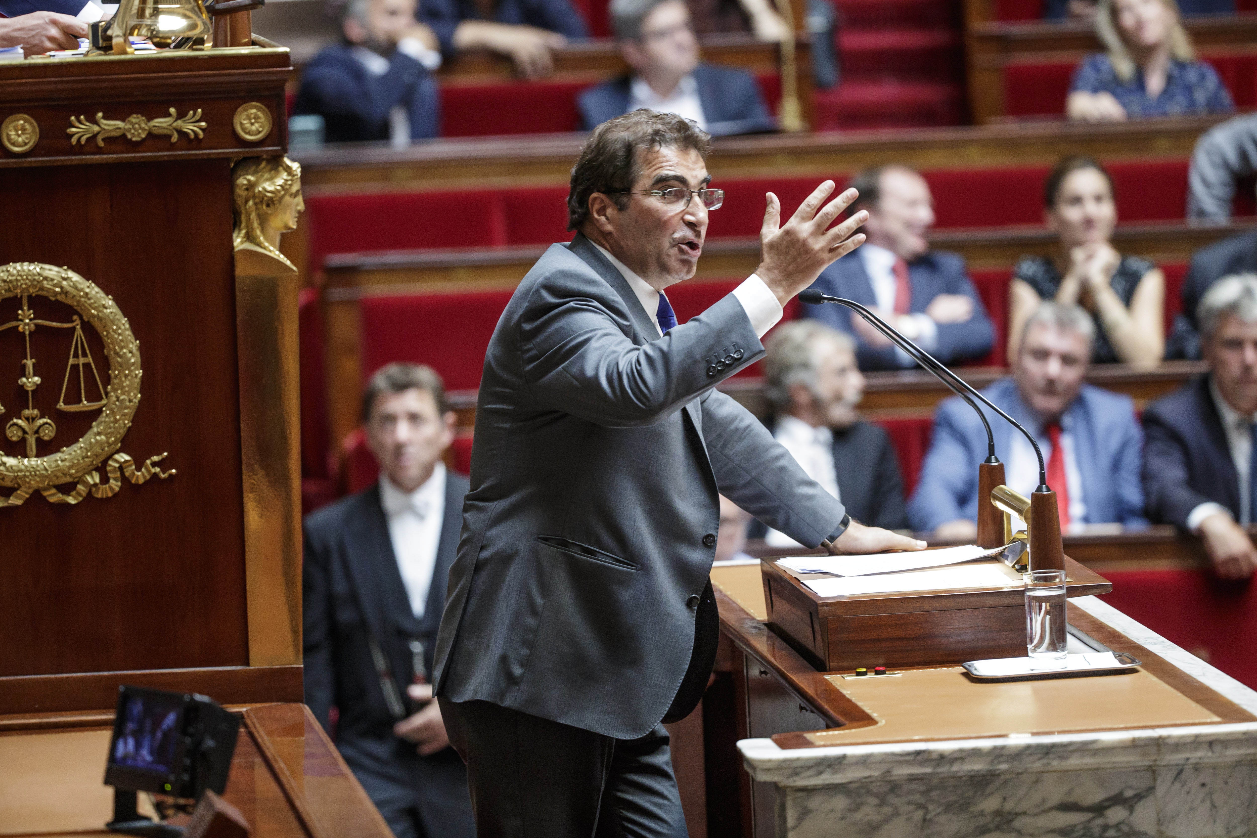 epa06920549 French right-wing party 'Les Republicains' group president Christian Jacob (C) delivers a speech during a debate prior to a non-confidence vote against the government at the National Assembly in Paris, France, 31 July 2018. Parliamentary proceedings are disrupted by opposition MPs following the scandal of President Macron's security chief Alexandre Benalla after a video has been released on 19 July 2018 showing Benalla wearing a riot helmet and police uniform, allegedly attacking protesters during street demonstrations on 01 May 2018.  EPA/CHRISTOPHE PETIT TESSON