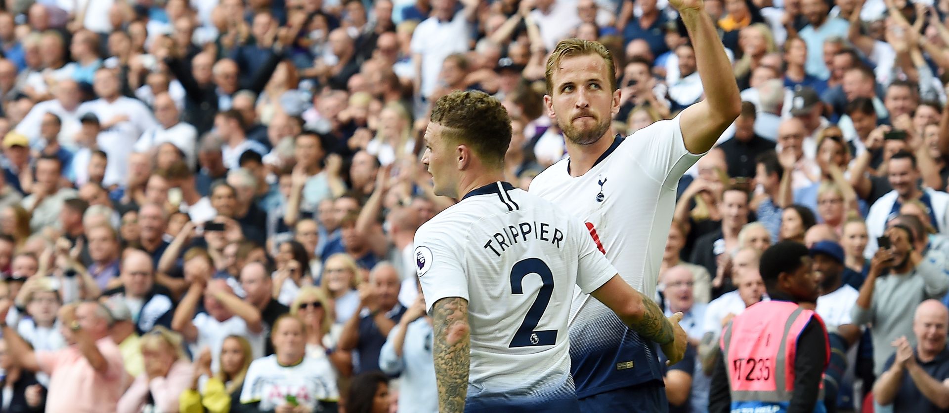 epa06956480 Tottenham's Harry Kane (R) celebrates with team mate Kieran Trippier (L) after scoring his teams third goal against Fulham during the English Premier League soccer match Tottenham vs Fulham at Wembley Stadium in London, Britain, 18 August 2018.  EPA/ANDY RAIN EDITORIAL USE ONLY. No use with unauthorized audio, video, data, fixture lists, club/league logos or 'live' services. Online in-match use limited to 120 images, no video emulation. No use in betting, games or single club/league/player publications.