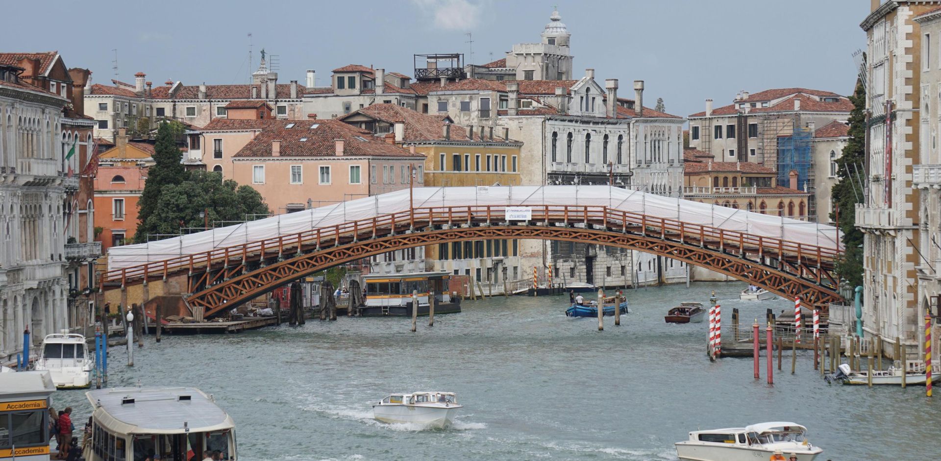 epa06970755 A view of the Ponte dell'Accademia bridge, between the two banks of the Grand Canal (Canale Grande) after its renovation works, in Venice, northern Italy, 25 August 2018. The bridge will be reopened on 29 August 2018, after restoration works, with a re-opening ceremony.  EPA/ANDREA MEROLA