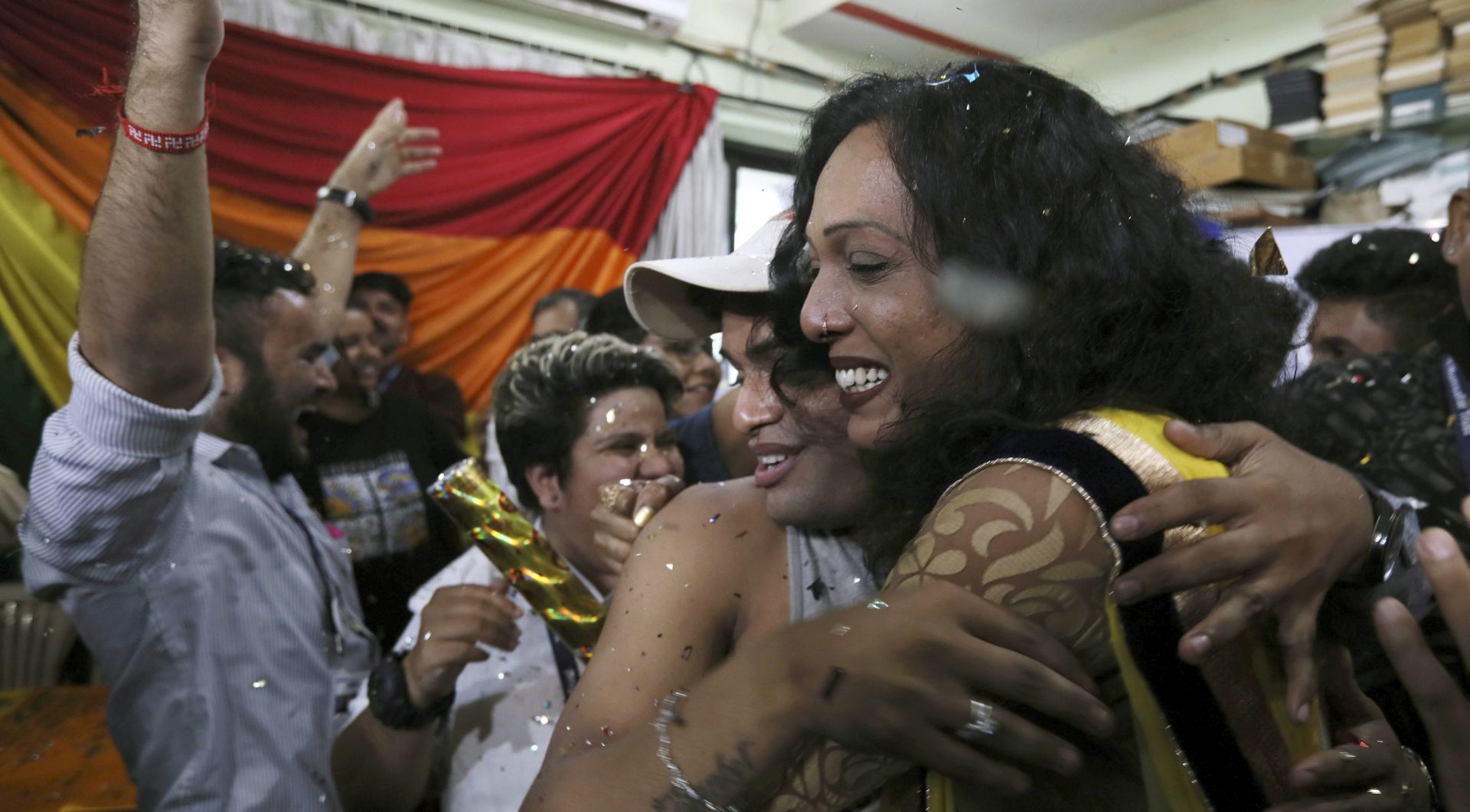 epa07000160 Indian activists of the lesbian, gay, bisexual, and transgender (LGBT) community react after the hearing at the Supreme Court, at the Humsafar Trust in Mumbai, India, 06 September 2018. India's Supreme Court ruled on 06 September 2018, that gay sex is no longer a criminal offence. Five Supreme Court judges repealed a colonial-era law (section 377) and legalize gay sex between consenting adults.  EPA/DIVYAKANT SOLANKI