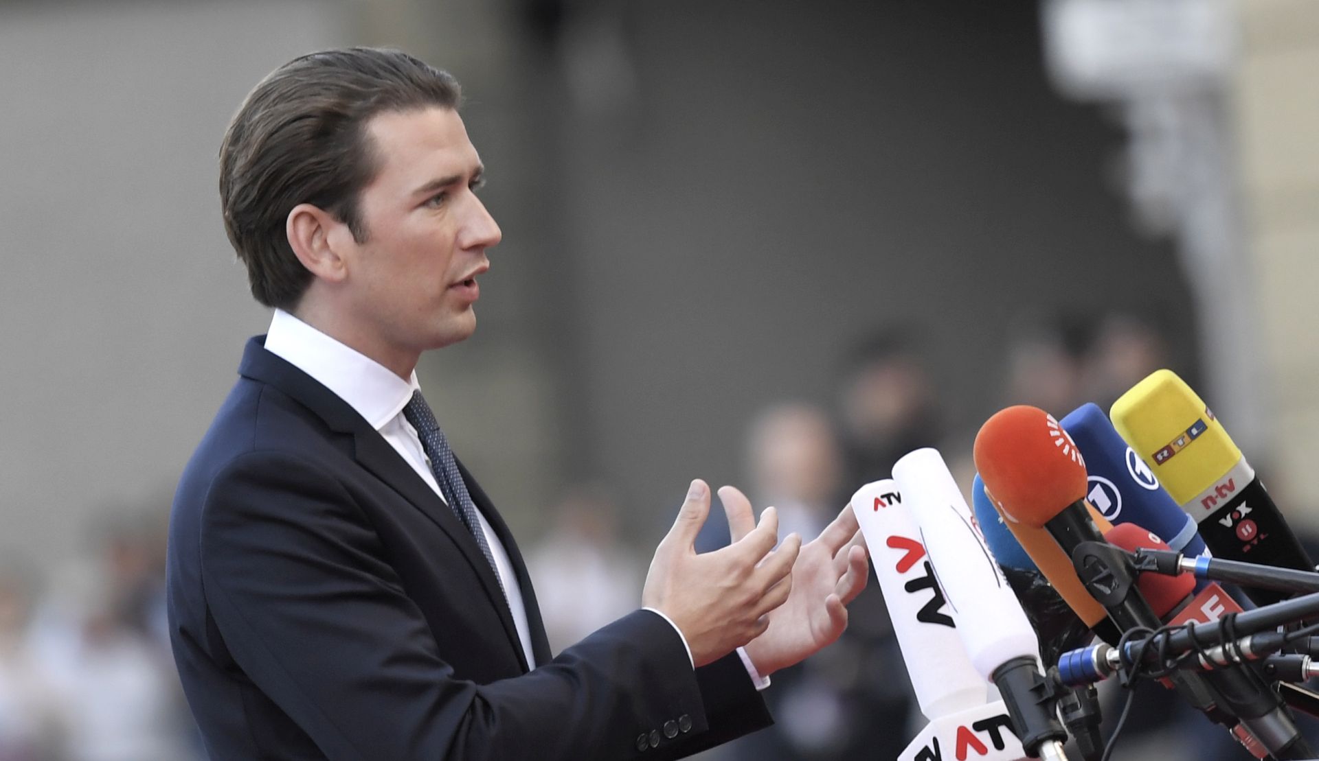 epa07032519 Federal Chancellor of Austria Sebastian Kurz speaks to the media as he arrives for a dinner at the Felsenreitschule theatre, during the European Union's (EU) Informal Heads of State Summit in Salzburg, Austria, 19 September 2018. EU countries' leaders meet on 19 and 20 September for a summit to discuss internal security measures, migration and Brexit.  EPA/CHRISTIAN BRUNA