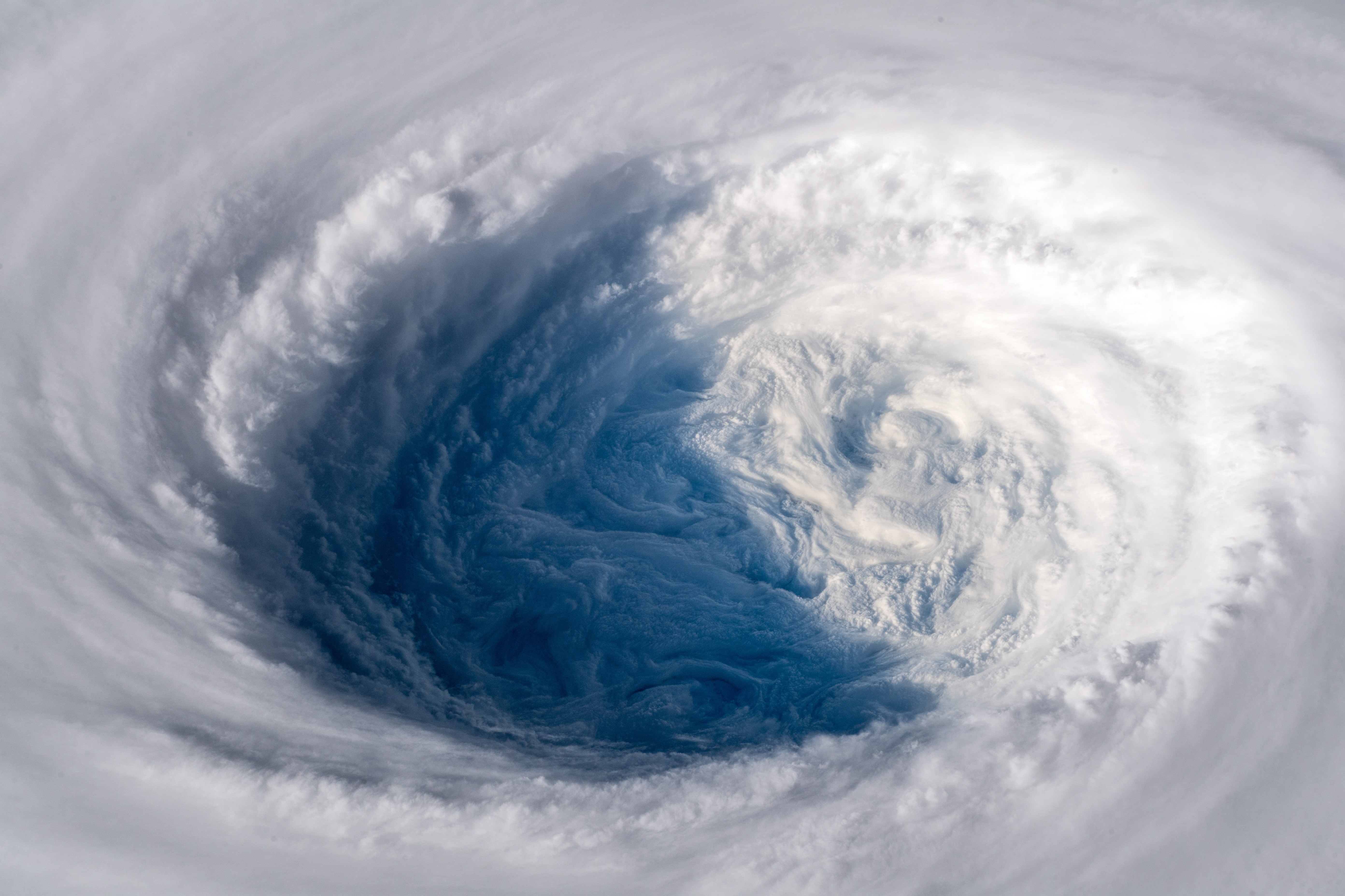 epa07048928 A handout photo made available by Germany's European Space Agency (ESA) astronaut Alexander Gerst on his Flickr site shows a view onto the 'eye' of Supertyphoon Trami as seen from the International Space Stateion ISS on 25 September 2018 (issued 26 September 2018. Gerst posted the image with a comment: 'As if somebody pulled the planet's gigantic plug. Staring down the eye of yet another fierce storm. Category 5 Super Typhoon Trami is unstoppable and heading for Japan and Taiwan. Be safe down there!' The typhoon is expected to make landfall in Japan on Sunday, 30 September 2018.  EPA/ALEXANDER GERST / HANDOUT MANDATORY CREDIT: ESA/NASA - ALEXANDER GERST HANDOUT EDITORIAL USE ONLY/NO SALES