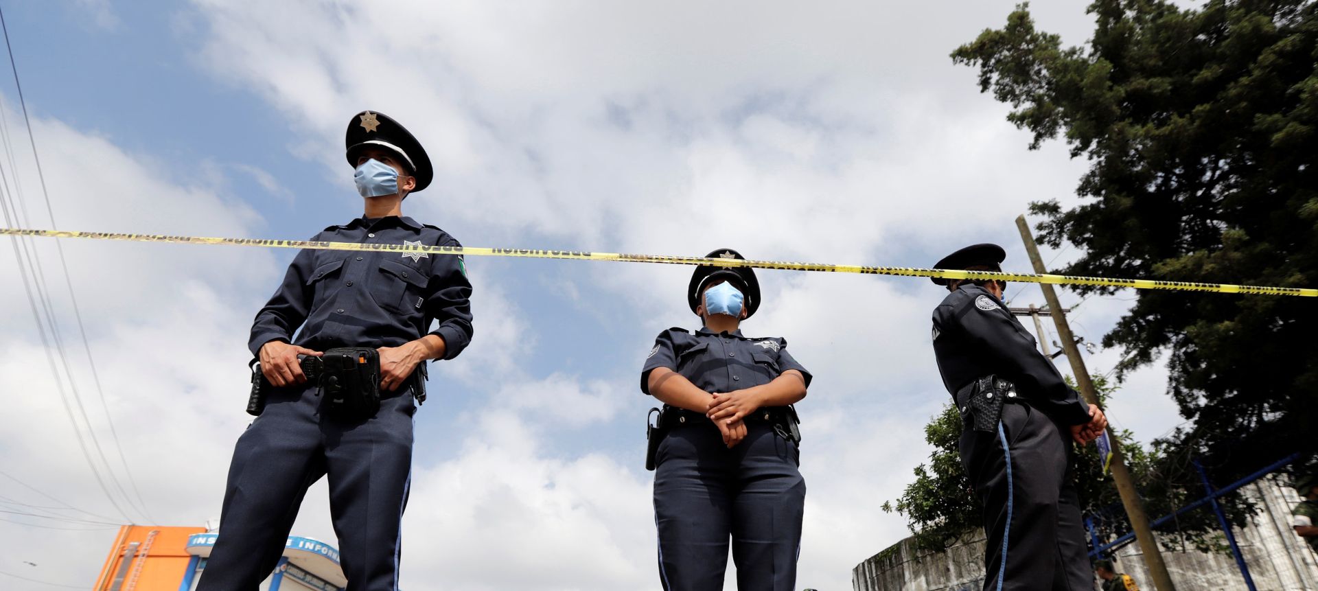 Police officers keep watch at the perimeter of an area evacuated due a gas leak caused by a pipeline theft in Puebla Police officers keep watch at the perimeter of an area evacuated due a gas leak caused by a pipeline theft in Puebla, Mexico September 12, 2018. REUTERS/Imelda Medina IMELDA MEDINA
