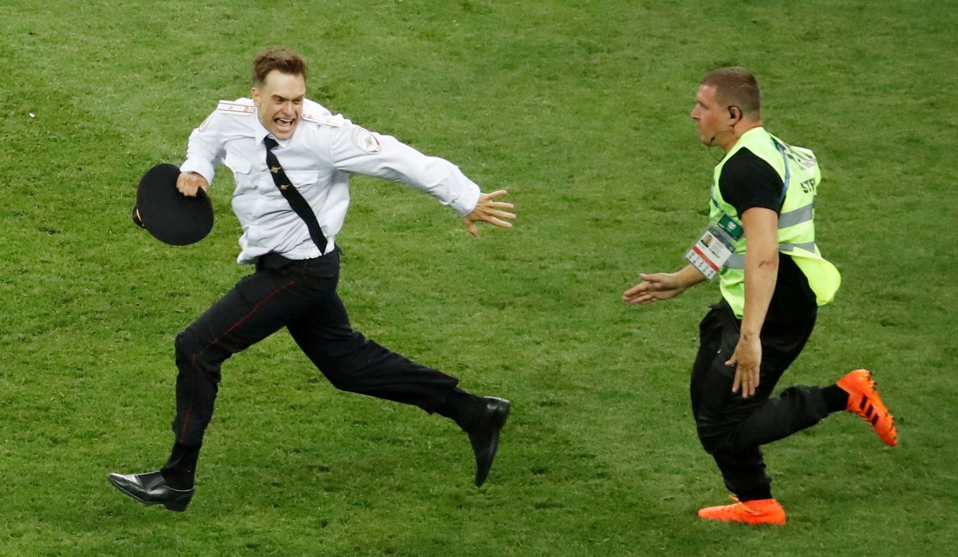 FILE PHOTO: World Cup - Final - France v Croatia FILE PHOTO: Soccer Football - World Cup - Final - France v Croatia - Luzhniki Stadium, Moscow, Russia - July 15, 2018  Pitch invader Pyotr Verzilov is chased by a steward during the match   REUTERS/Christian Hartmann/File Photo Christian Hartmann