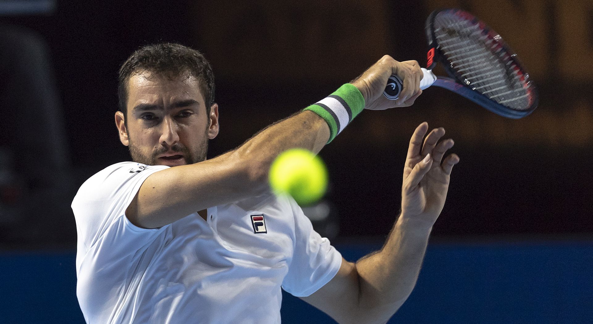 epa07111992 Croatia's Marin Cilic in action during his first round match against Canada's Denis Shapovalov at the Swiss Indoors tennis tournament at the St. Jakobshalle in Basel, Switzerland, 22 October 2018.  EPA/GEORGIOS KEFALAS