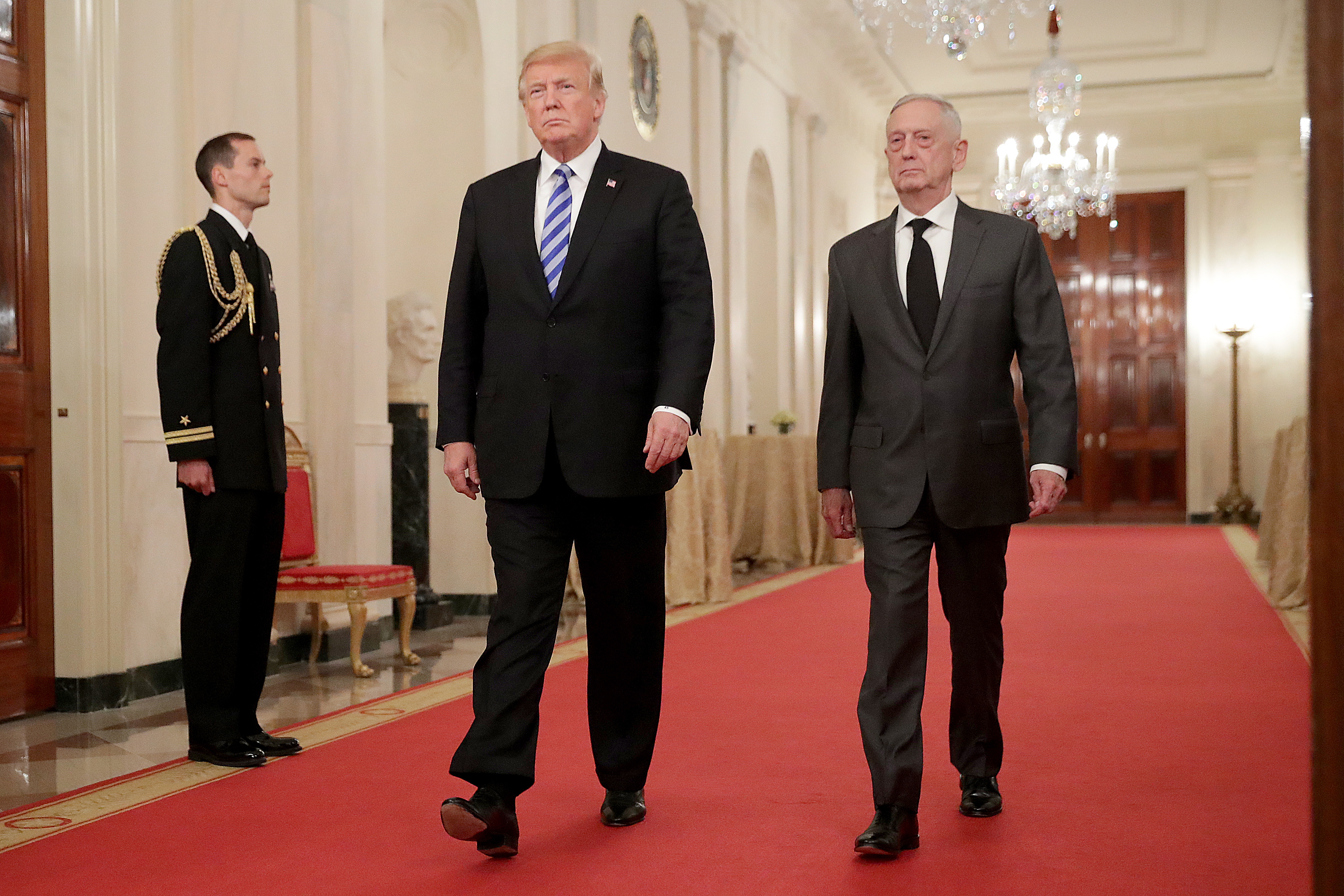 epa07120422 US President Donald J. Trump (L) and Defense Secretary James Mattis (R) arrive for an event commemorating the 35th anniversary of attack on the Beirut Barracks in the East Room of the White House in Washington, DC, USA, 25 October 2018. On 23 October 1983, two truck bombs struck the buildings housing Multinational Force in Lebanon (MNF) peacekeepers, killing 241 US and 58 French peacekeepers and 6 civilians.  EPA/CHIP SOMODEVILLA / POOL