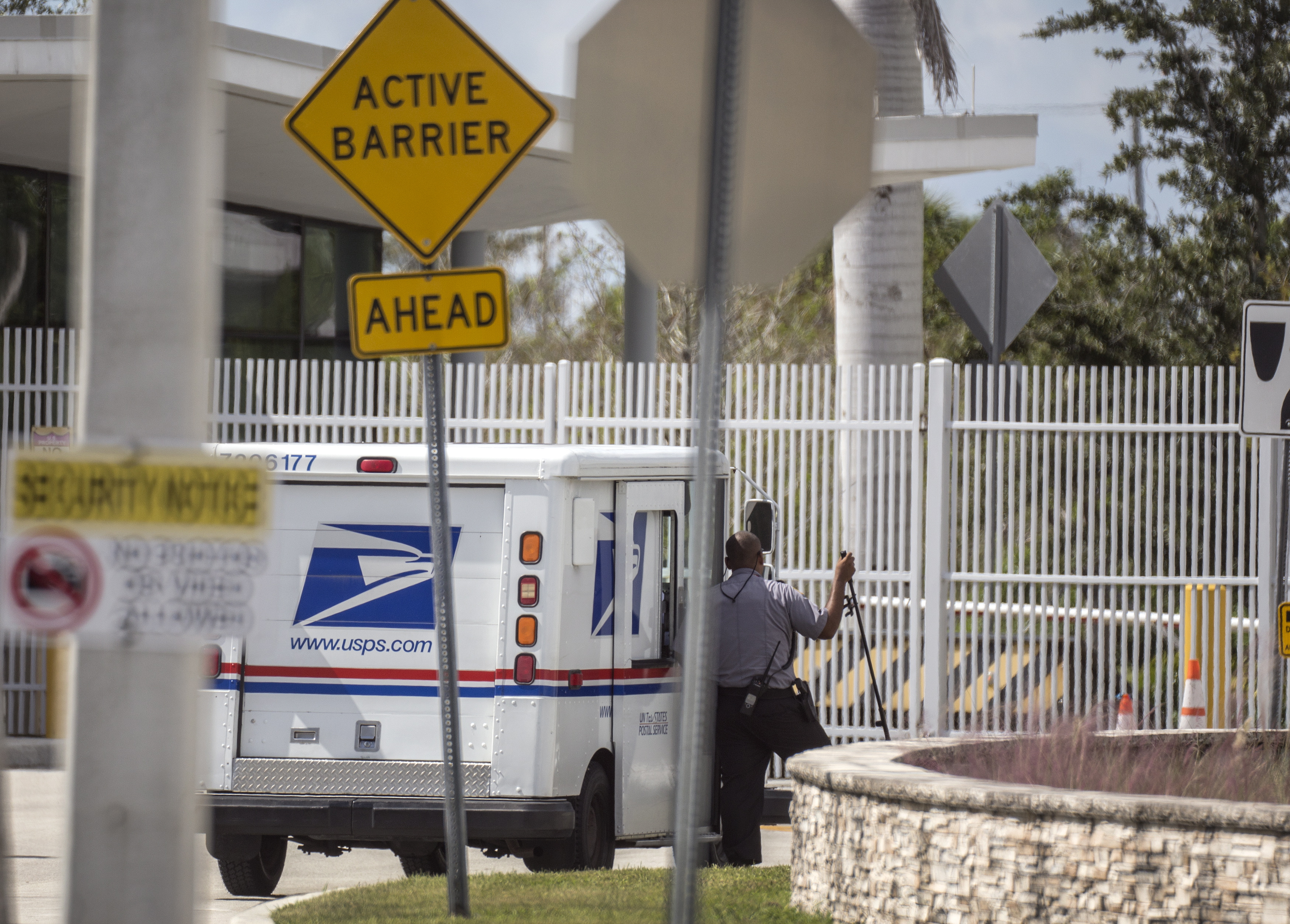 epa07121923 A US Postal Service truck is seen at the FBI Miami-Division facility where the van of the suspect in connection to the packages containing pipe bombs was taken in Miramar, Florida, USA, 26 October 2018. Cesar Sayoc was arrested in Plantation, Florida, USA, on 26 October 2018 for his alleged role in connection to the packages containing pipe bombs which were sent in recent days to several prominent figures across the country, sparking a sprawling nationwide investigation.  FBI Assistant Director William Sweeney warned the 'American public to remain vigilant as it does remain possible further packages have been or could be mailed.  EPA/CRISTOBAL HERRERA