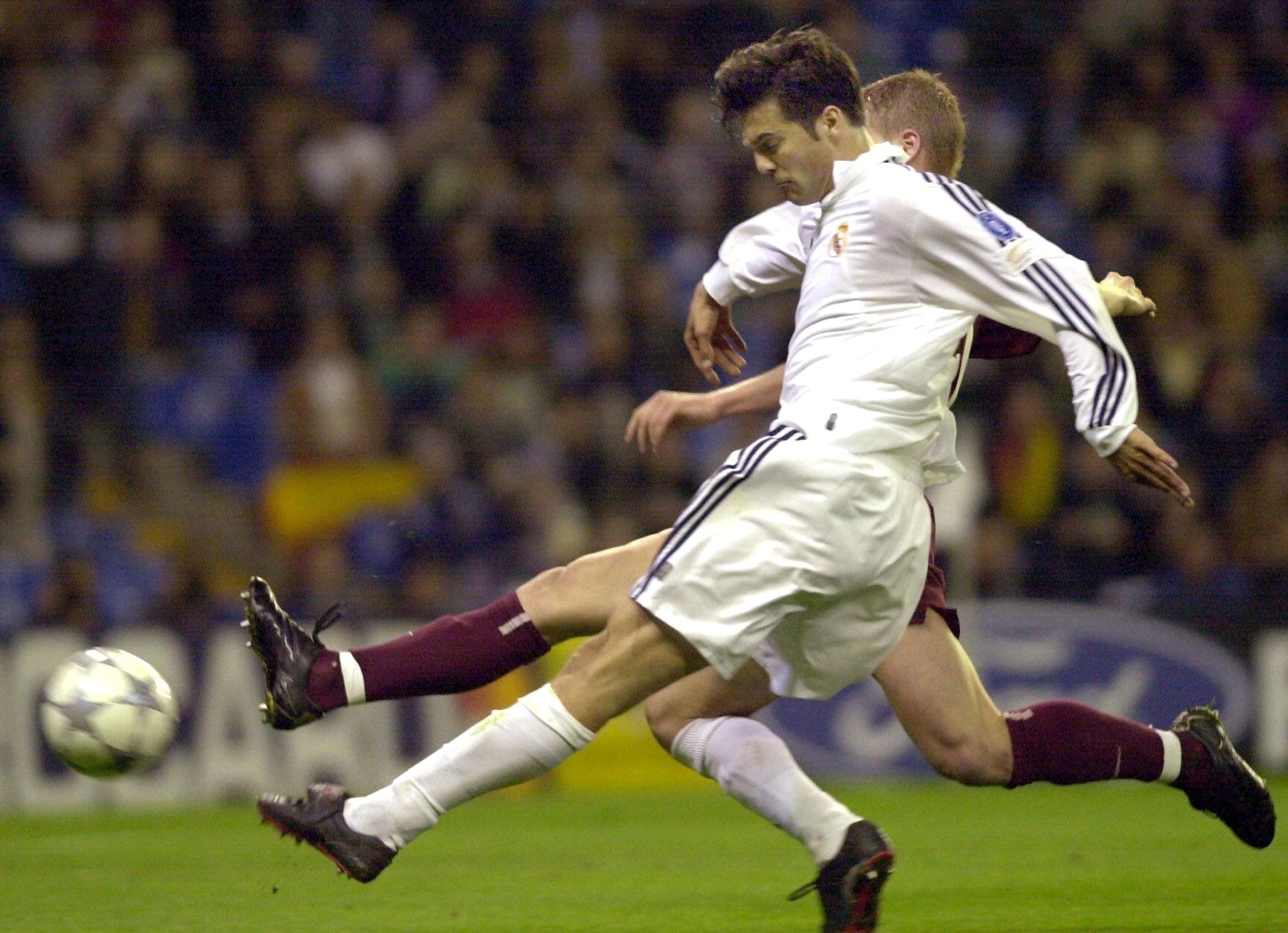 epa07131038 (FILE) - Real Madrid's Santiago Solari (front) fights for the ball with Sparta Prague's Jiri Jarosik (background) during their Champions League group C soccer match at the Santiago Bernabeu stadium in Madrid, Tuesday 12 March 2002. Solari was appointed on 29 October 2018 as interim replacement of Julen Lopetegui as head coach of Real Madrid. Lopetegu was sacked following the team's defeat against Barcelona on 28 October. c
