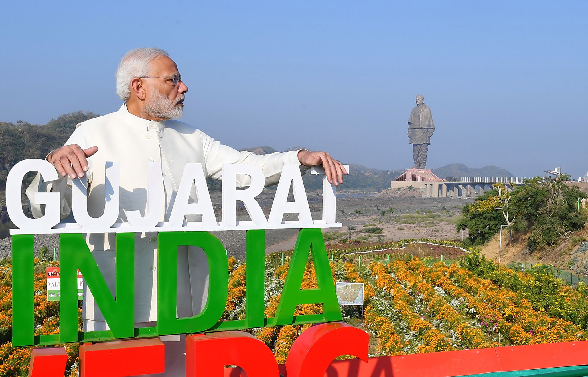 epa07132435 A handout photo made available by the Indian Press Information Bureau (PIB) on 31 October 2018 showing the Indian Prime Minister Narendra Modi near the newly built and inaugurated Statue of Unity, a monument dedicated to Indian independence movement leader Sardar Vallabhbhai Patel, near Narmada Dam in Gujarat, India, 31 October 2018. Prime Minister Modi inaugurated the 182 metres or 597.11 feet statue which is the tallest in the world which cost 430 million US dollars to construct.  EPA/PRESS INFORMATION BUREAU PIB / HANDOUT  HANDOUT EDITORIAL USE ONLY/NO SALES