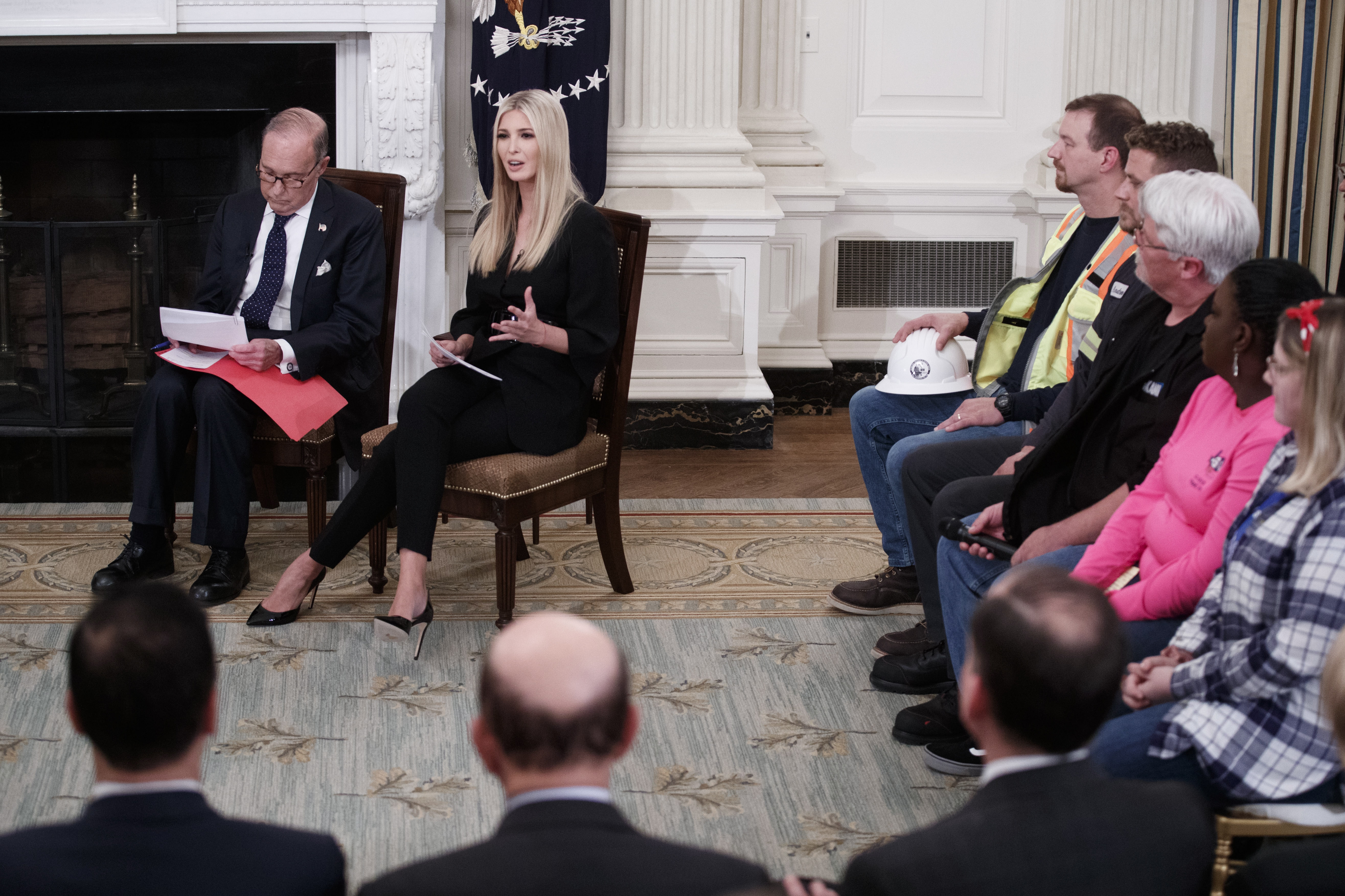 epa07134112 Director of the US National Economic Council Larry Kudlow (L) and Ivanka Trump (2-L) participate in an Our Pledge to America's Workers event in the State Dining Room of the White House in Washington, DC, USA, 31 October 2018.  EPA/SHAWN THEW