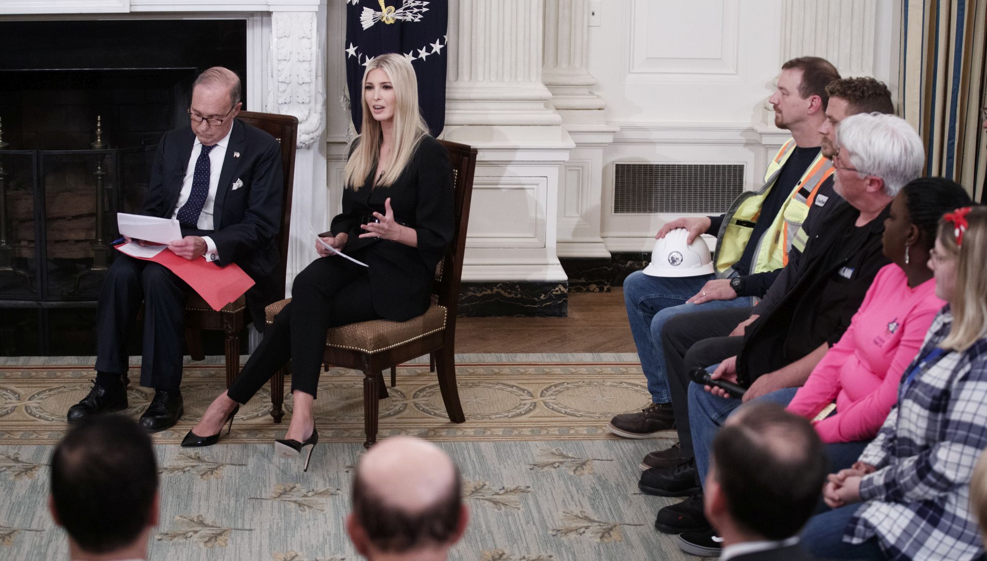epa07134112 Director of the US National Economic Council Larry Kudlow (L) and Ivanka Trump (2-L) participate in an Our Pledge to America's Workers event in the State Dining Room of the White House in Washington, DC, USA, 31 October 2018.  EPA/SHAWN THEW
