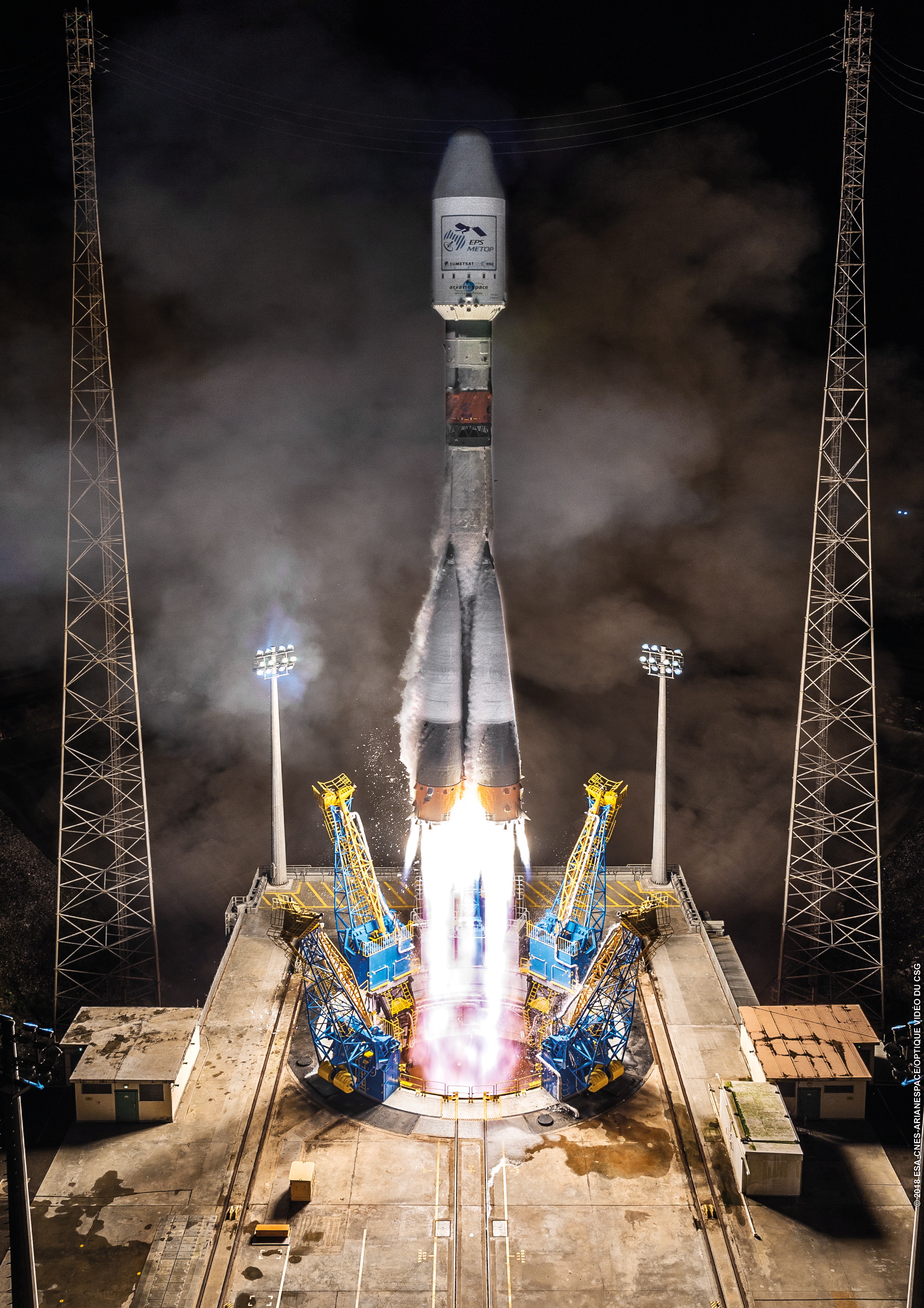 epa07148429 A handout photo made available by the Centre National d'Etudes Spatiales (CNES) shows a Soyuz rocket launching to bring into orbit the Metop-C weather satellite for EUMETSAT, at the Arianespace launch site in Kourou, French Guiana, 06 November 2018 (issued 07 November 2018).  EPA/JM GUILLON / ESA/CNES/ARIANESPAC  HANDOUT EDITORIAL USE ONLY/NO SALES
