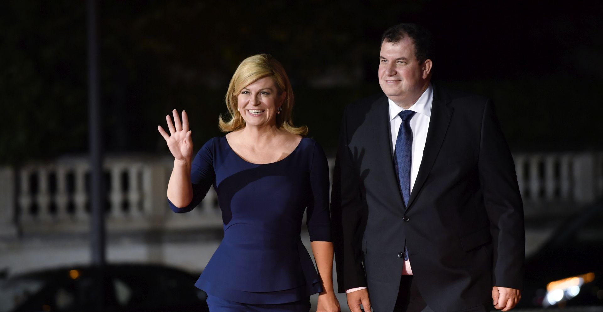 epa07156736 Croatian President Kolinda Grabar-Kitarovic (L) and husband Jakov Kitarovic arrive at the official dinner on the eve of the international ceremony for the Centenary of the WWI Armistice of 11 November 1918 at the Orsay museum in Paris, France, 10 November 2018. Heads of State and Government commemorate the memory of their fallen soldiers in France.  EPA/JULIEN DE ROSA