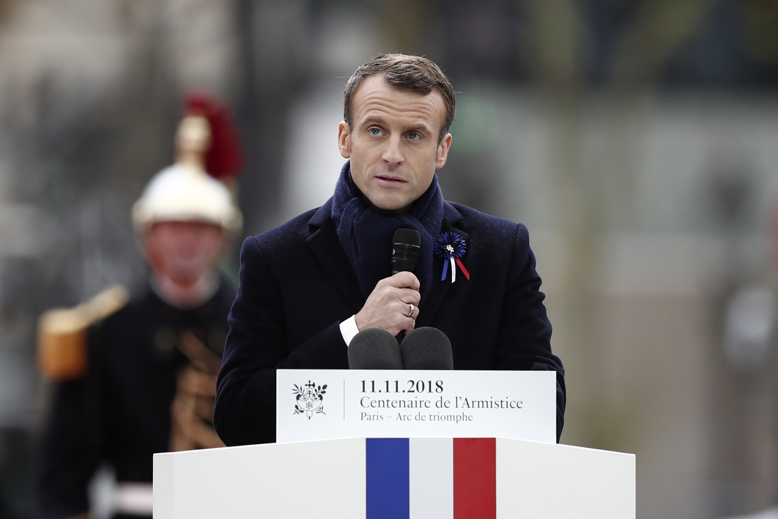 epa07157720 French President Emmanuel Macron delivers his speech during the international ceremony for the Centenary of the WWI Armistice of 11 November 1918 at the Arc de Triomphe, in Paris, France, 11 November 2018. Heads of State and Government commemorate their fallen soldiers in France.  EPA/FRANCOIS MORI / POOL MAXPPP OUT