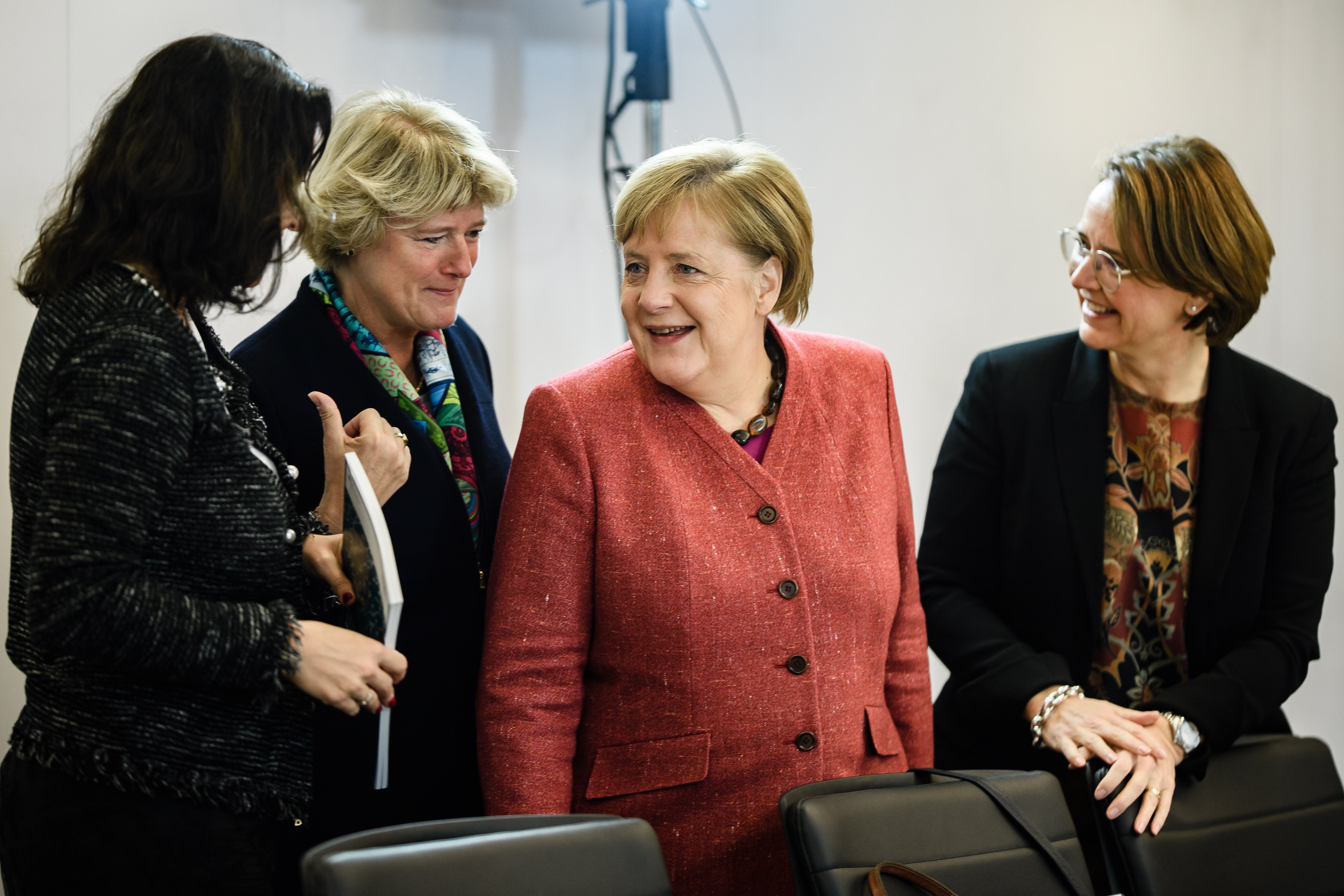 epa07166561 (L-R) State secretary for Digitalization Dorothee Baer, German State Culture Minister Monika Gruetters, German Chancellor Angela Merkel and German State Secretary for Migration, Refugees and Integration Annette Widmann-Mauz talk during a Cabinet meeting on digitization at the Hasso Plattner Institute in Potsdam, Germany, 15 November 2018. The German cabinet will discuss with IT specialists the artificial intelligence and the user data protection among others. The Hasso Plattner Institute is a privately funded IT institute and faculty of the University of Potsdam.  EPA/CLEMENS BILAN