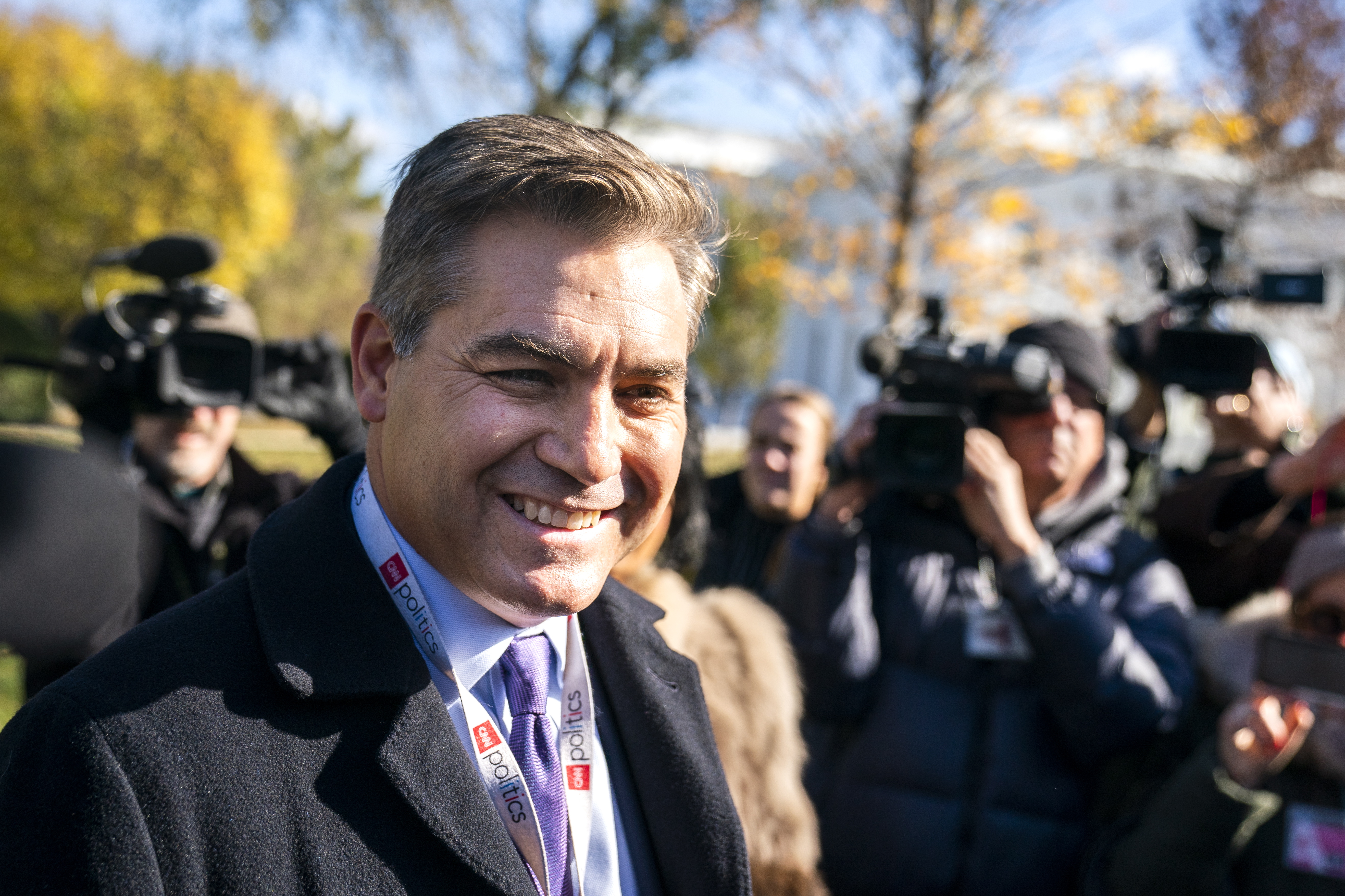 epa07170837 CNN reporter Jim Acosta returns to the White House after winning his lawsuit against the Trump administration, which had revoked his press pass, in Washington, DC, USA, 16 November 2018. Acosta and President Trump had a heated exchange during a November 07 press conference, leading to the White House pulling Acosta's White House hard pass.  EPA/JIM LO SCALZO