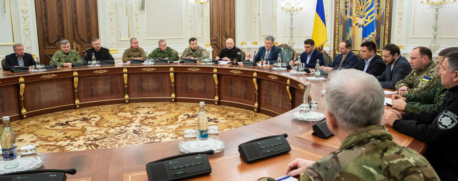 epa07190230 Ukrainian President Petro Poroshenko (C) leads the National Security and Defence Council meeting in Kiev, Ukraine, 25 November 2018. Russia has seized three Ukrainian vessels amid their leaving the Kerch Strait; Ukrainian President Petro Poroshenko is gathering the Military Cabinet over the incident. The two small-sized `Berdiansk` and `Nikopol` armored artillery boats have come under enemy fire and are now dead in the water. The `Yany Kapu` tugboat has forcibly been stopped. The vessels have been captured by special forces of the Russian Federation, the press service of Ukraine`s Navy said on Facebook on Sunday evening. The Ukrainian Navy also reported the number of the Ukrainian servicemen wounded in the incident grew to two persons as Ukrainian media report.  EPA/MYKHAILO MARKIV / POOL