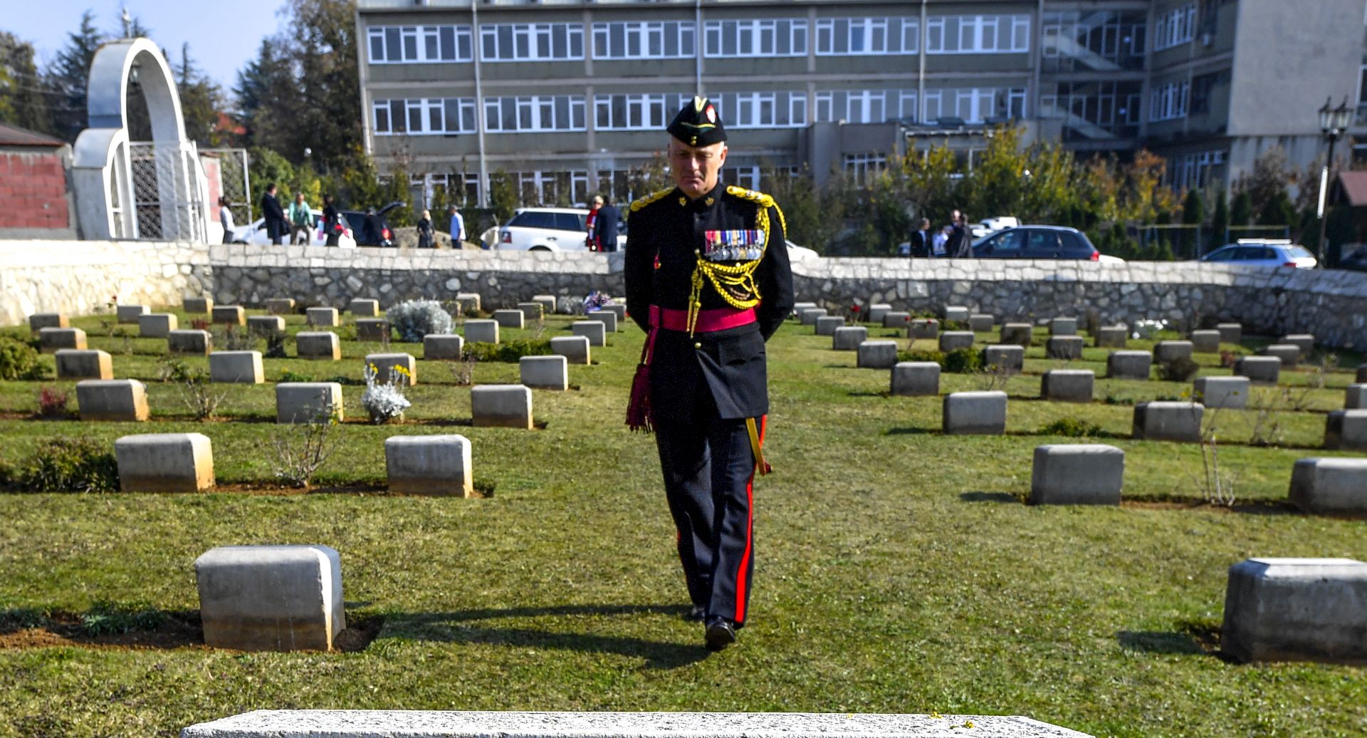 epa07157874 A British officer walks between the graves after a Service of Remembrance at the British Military Cemetery which contains the graves of British military personnel who lost their lives in the First World War in Skopje, The Former Yugoslav Republic of Macedonia on 11 November 2018. Remembrance Day is observed on 11 November to recall the official end of World War I on that date in 1918, as the major hostilities of World War I were formally ended with the German signing of the Armistice on the 11 November 1918. More than 100,000 soldiers were killed on the territory of Macedonia during World War I. World leaders have gathered in France to mark the 100th anniversary of the First World War Armistice with services taking place across the world to commemorate the occasion.  EPA/GEORGI LICOVSKI