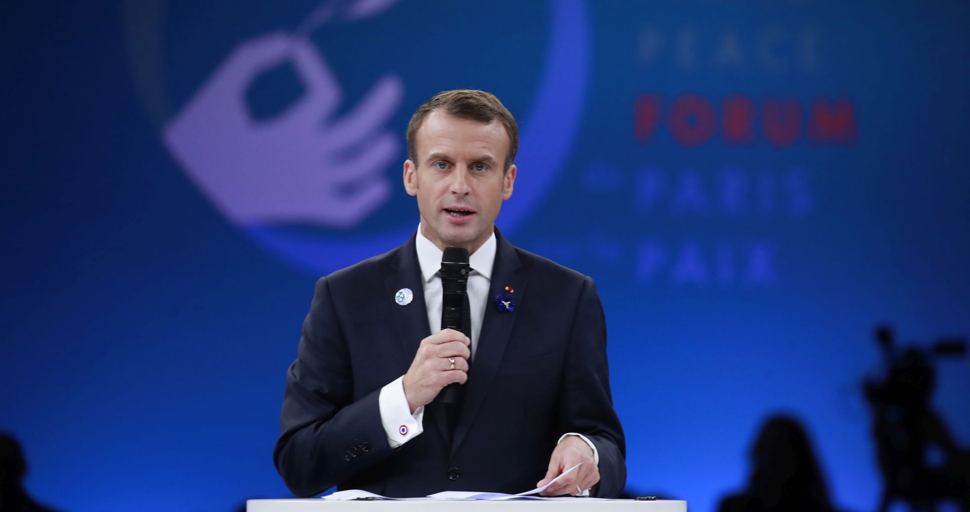 epa07158818 French President Emmanuel Macron delivers a speech at the opening session of the Paris Peace Forum as part of the international commemoration ceremony for the Centenary of the WWI Armistice of 11 November 1918, in Paris, France, 11 November 2018. World leaders have gathered in France to mark the 100th anniversary of the First World War Armistice with services taking place across the world to commemorate the occasion.  EPA/GONZALO FUENTES / POOL MAXPPP OUT