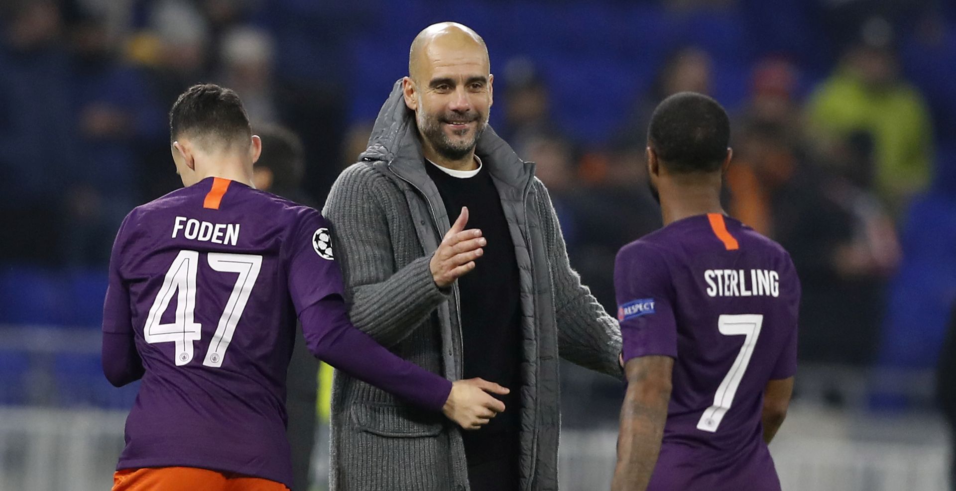 epa07193906 Josep Guardiola headcoach of Manchester City reacts with Manchester City's Phil Foden (L) and Raheem Sterling during the UEFA Champions League Group F soccer match between Olympique Lyon and Mancherster City, in Decines-Charpieu near Lyon, France, 27 November 2018.  EPA/GUILLAUME HORCAJUELO