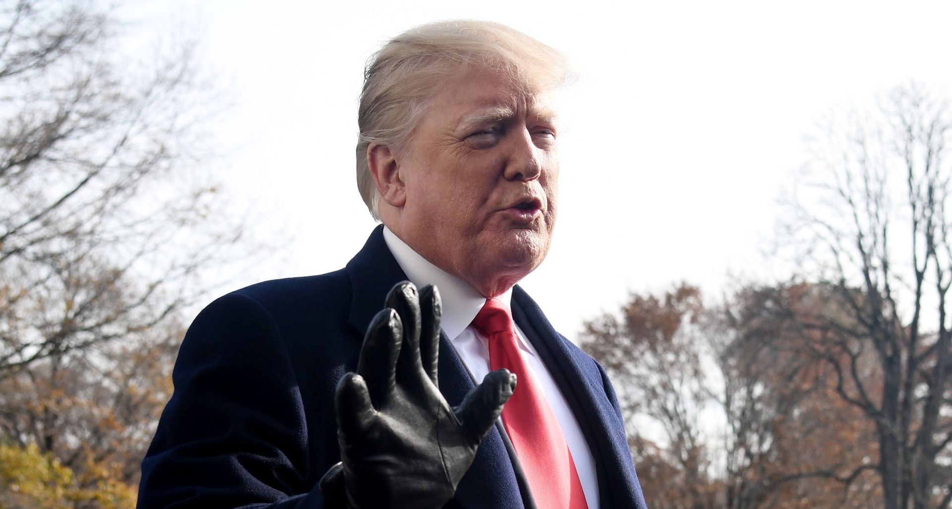 epa07218039 US President Donald J. Trump answers questions from the press while departing the White House in Washington, DC, USA, 08 December 2018. Trump said White House chief of staff John Kelly will resign by the end of the year, before departing for the 119th Army-Navy Football Game in Philadelphia, PA.  EPA/Olivier Douliery / POOL