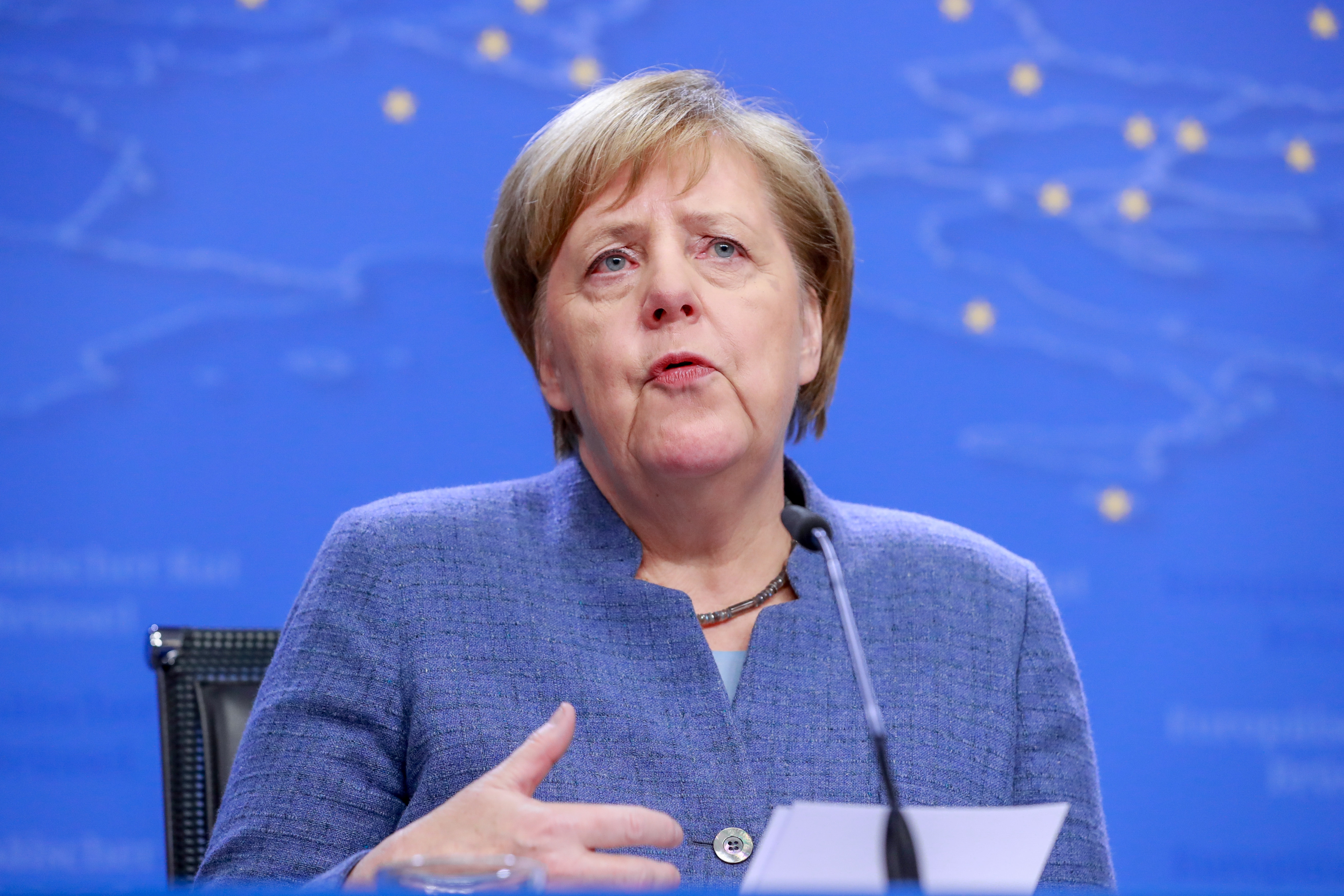 epa07231433 German Chancellor Angela Merkel speaks at a news conference at the end of an European Council meeting in Brussels, Belgium, 14 December 2018. On the second day of summit EU leader again focussed on the conclusions on the Single Market, climate change, migration, disinformation, the fight against racism and xenophobia, and citizens' consultations.  EPA/STEPHANIE LECOCQ