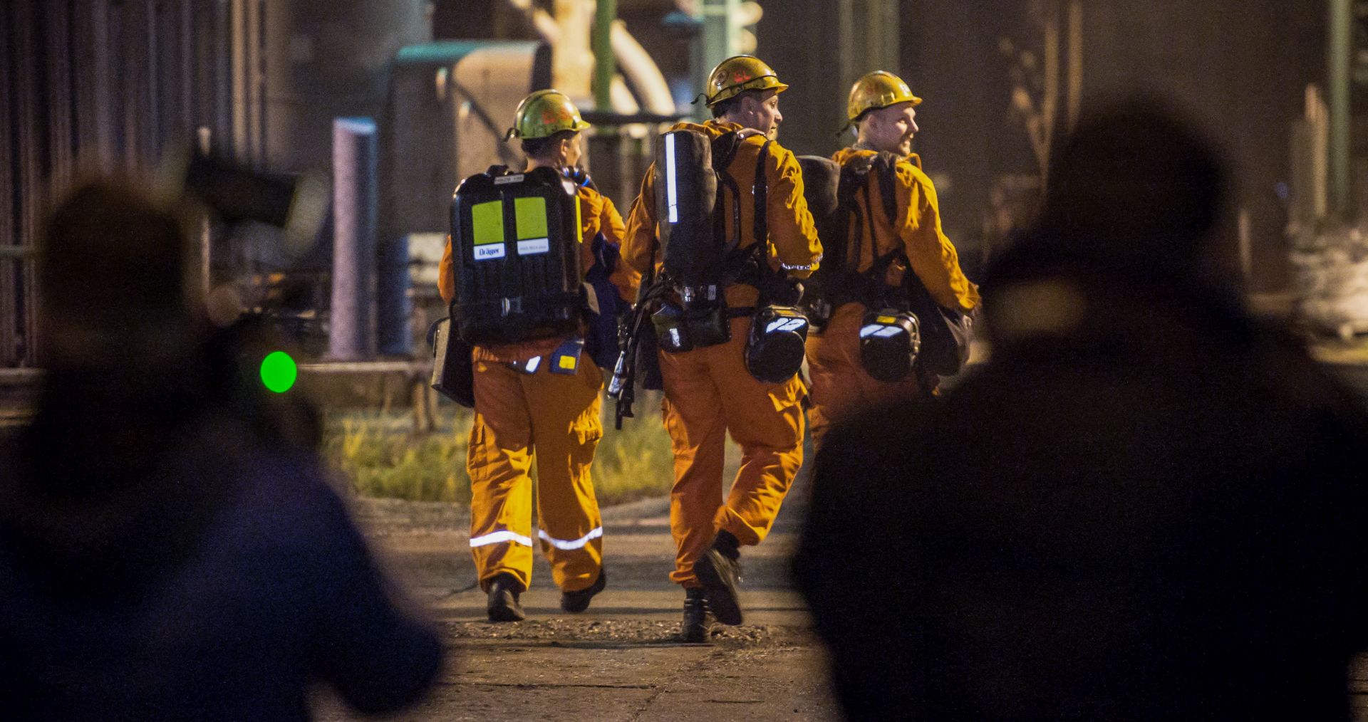 epa07242820 Mining rescue workers walk at the CSM coal mine near Czech-Polish border in Karvina, Czech Republic, 20 December 2018. At least one miner was killed in the blast and another ten were seriously injured, according to local media reports.  EPA/LUKAS KABON