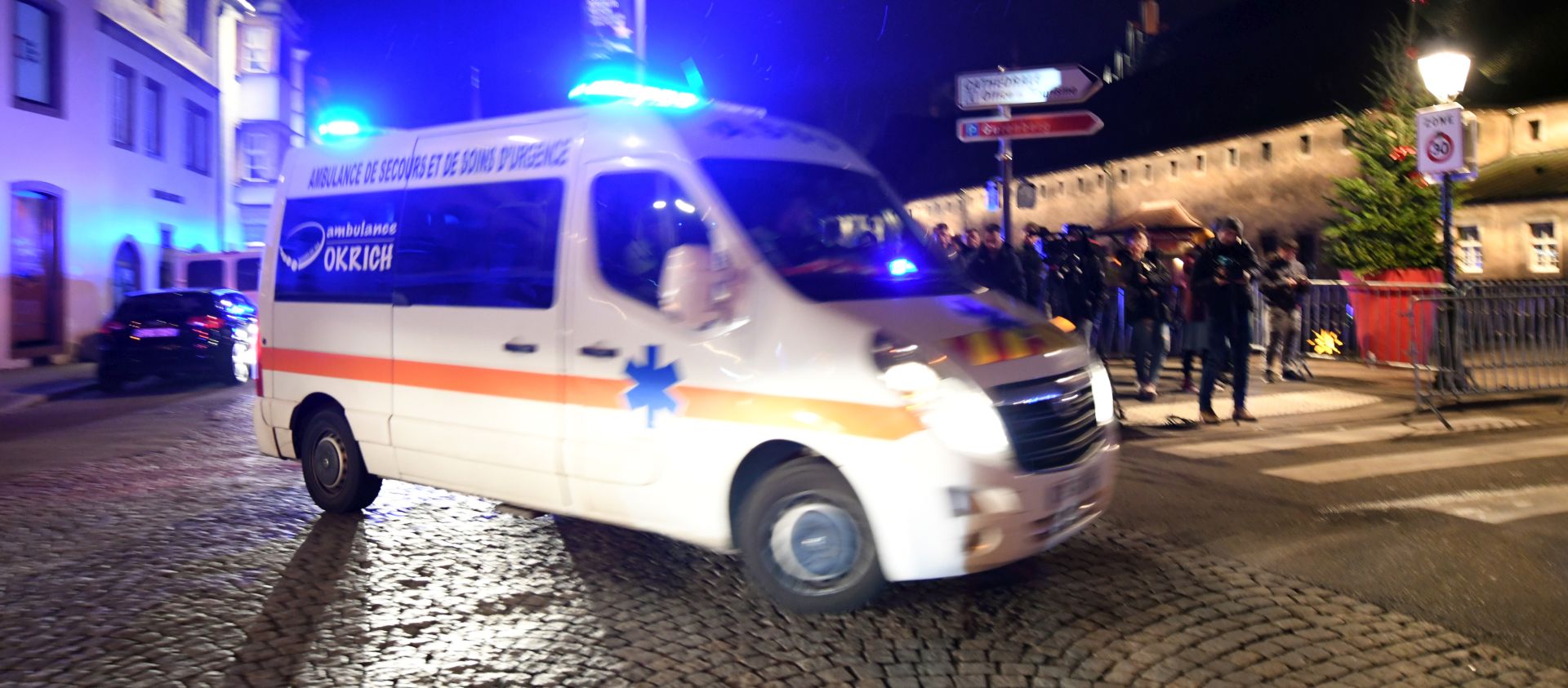 epa07224664 A French emergency vehicle enters the shooting site at the Christmas Market in Strasbourg, Alsace, France, 11 December 2018. According to latest report, two people are dead and 11 people are injured. The gunman is reported to be at large and the motive for the attack is still unclear.  EPA/PATRICK SEEGER