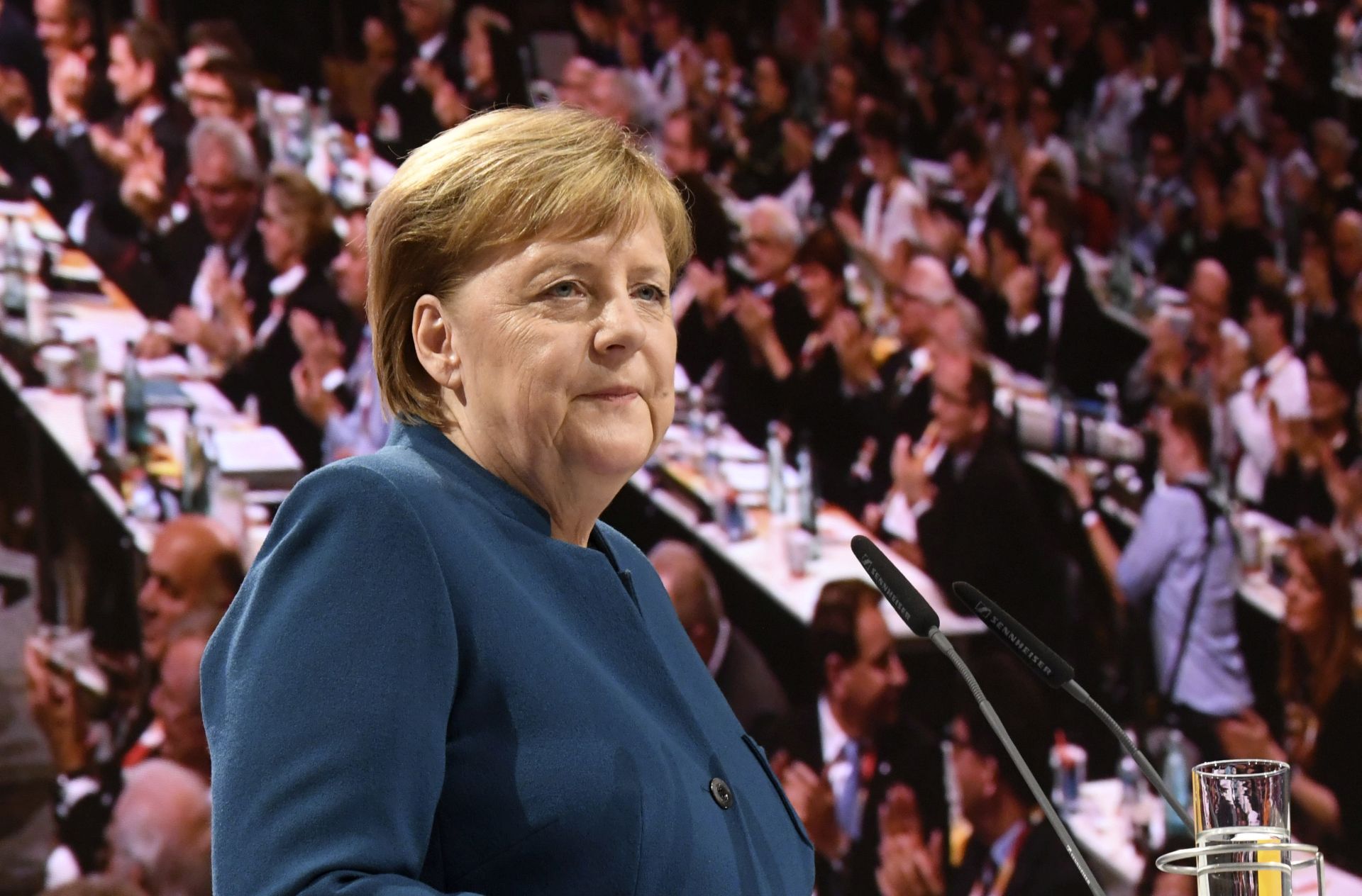 epa07214332 German Chancellor Angela Merkel receives applause from the delegates during the 31st Party Congress of the Christian Democratic Union (CDU) in Hamburg, Germany, 07 December 2018. At the party congress, a new party leader is to be elected. Associated with the new party leader is the debate over the fundamental political orientation of the CDU after Chancellor Merkel will no longer hold this office.  EPA/CLEMENS BILAN