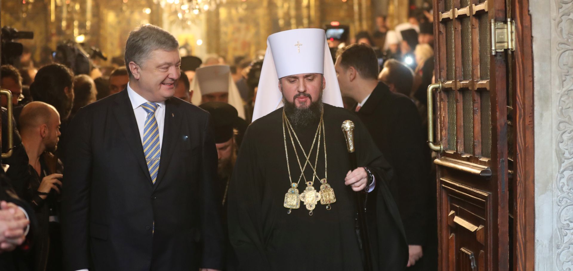 epa07263052 Ukrainian President Petro Poroshenko (L) and Bishop of the Ukrainian Orthodox Church of the Kyiv Patriarchate, Metropolitan of Pereiaslav and Bila Tserkva Epifaniy (Serhiy Dumenko) (R) leaves after attending the ceremony for receiving the Tomos of autocephaly from the Ecumenical Patriarch Bartholomew I (not pictured), a spiritual leader of the Orthodox Christian around the world, at St George Church in Istanbul, 05 January 2019. Bishop of the Ukrainian Orthodox Church of the Kyiv Patriarchate, Metropolitan of Pereiaslav and Bila Tserkva Epifaniy (Serhiy Dumenko) has been elected head of the local Orthodox Church in Ukraine at the unification council of the Ukrainian Orthodox churches on 15 December 2018. The Holy Synod announced its decision that the Ecumenical Patriarchate would proceed to grant autocephaly to the Church of Ukraine on 11 October 2018.  EPA/ERDEM SAHIN