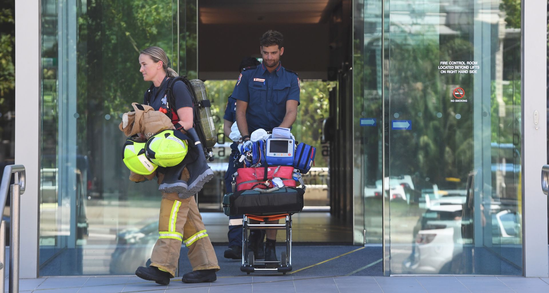 epa07270517 Emergency service personel exit the building where the Korean consulate is located in Melbourne, Australia, 09 January 2019. Staff have been evacuated as emergency crews respond to a number of incidents involving foreign consulates in Melbourne.  EPA/JAMES ROSS AUSTRALIA AND NEW ZEALAND OUT