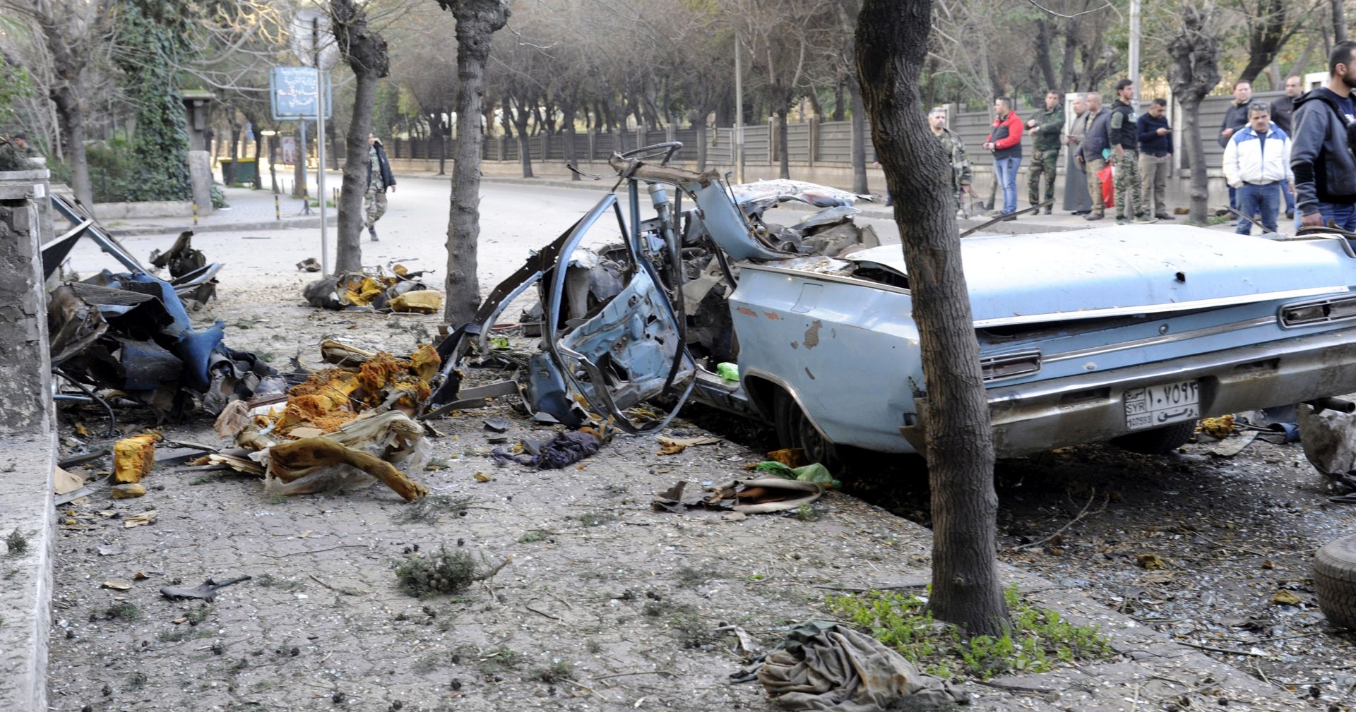 epa07316091 A handout photo made available by the Syrian Arab News Agency (SANA) shows the remains of a car following a blast that took place in al-Adawi area in Damascus, Syria, 24 January 2019. An explosive device planted to a car, causing material damage, and no causalities were reported, according to SANA.  EPA/SANA HANDOUT  HANDOUT EDITORIAL USE ONLY/NO SALES