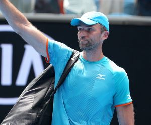 epa07291531 Ivo Karlovic of Croatia waves as he leaves the court after being defeated by Kei Nishikori of Japan during their second round match on day four of the Australian Open tennis tournament in Melbourne, Australia, 17 January 2019.  EPA/HAMISH BLAIR  AUSTRALIA AND NEW ZEALAND OUT