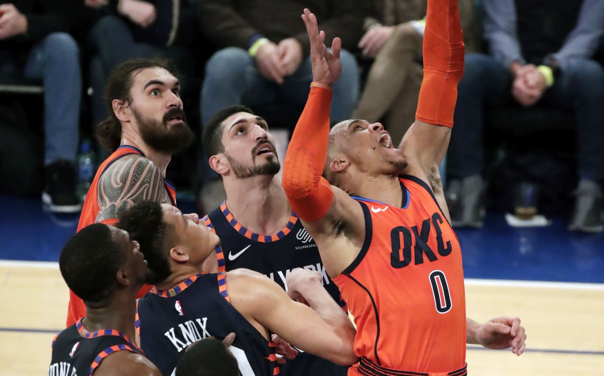 epa07307331 Oklahoma City Thunder guard Russell Westbrook (R) tries to put up a shot under the basket past the New York Knicks defense (L) in the second half of the NBA basketball game between the Oklahoma City Thunder and the New York Knicks at Madison Square Garden in New York, New York, USA, 21 January 2019.  EPA/JASON SZENES SHUTTERSTOCK OUT