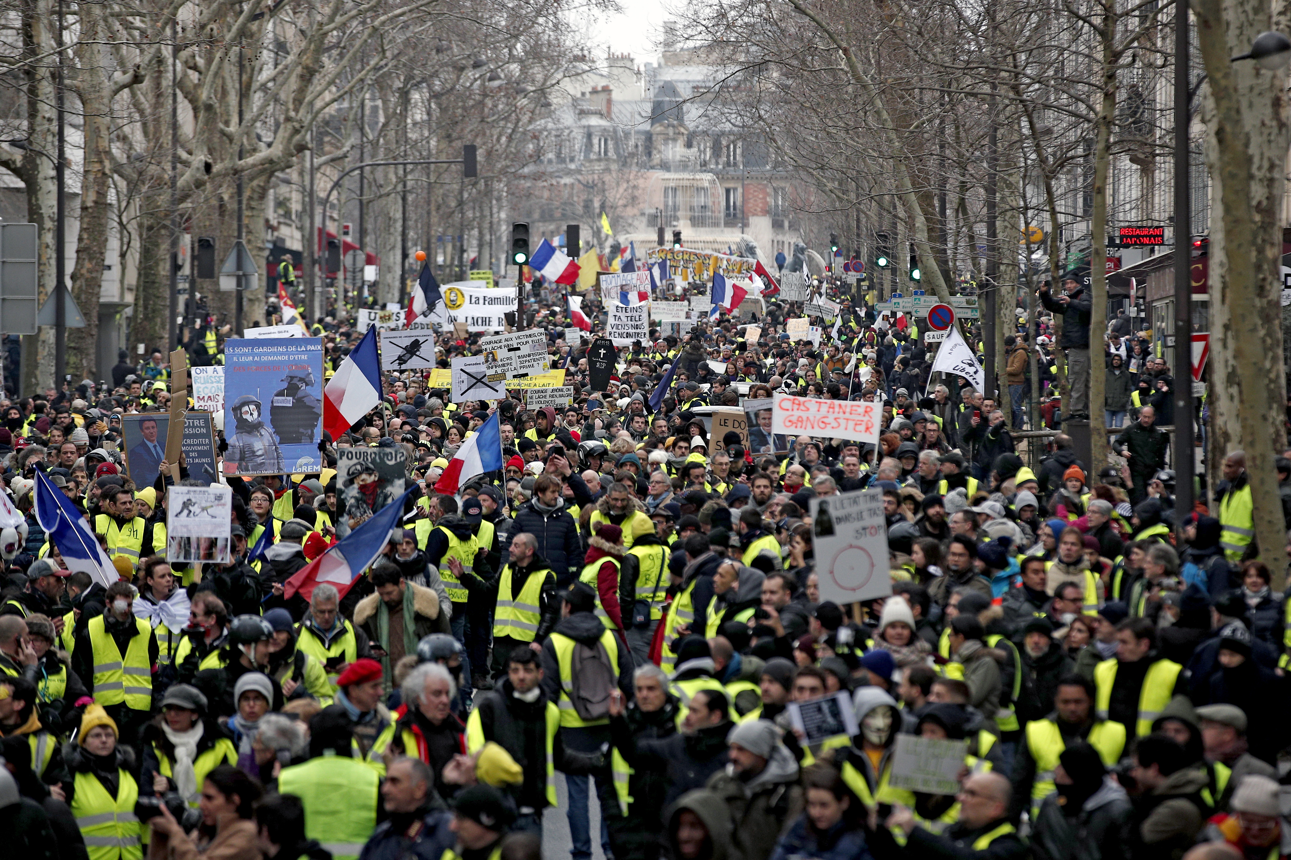 epa07337962 Protesters from the 'Gilets Jaunes' (Yellow Vests) movement take part in the 'Act XII' demonstration (the 12th consecutive national protest on a Saturday) in Paris, France, 02 February 2019. The so-called 'gilets jaunes' (yellow vests) is a grassroots protest movement with supporters from a wide span of the political spectrum, that originally started with protest across the nation in late 2018 against high fuel prices. The movement in the meantime also protests the French government's tax reforms, the increasing costs of living and some even call for the resignation of French President Emmanuel Macron.  EPA/YOAN VALAT