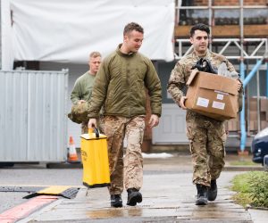 epa07342961 Army officers wearing combat uniform are seen  after removing what is believed to be part of the roof at the house of former Russian spy Sergei Skripal in Christie Miller Road in Salisbury, Britain, 04 February 2019.  The work follows a poisoning incident last year on 04 March 2018 when former Russian spy Sergei Skripal and his daughter Yulia became seriously ill after allegedly being exposed to Novichok nerve agent.  EPA/VICKIE FLORES