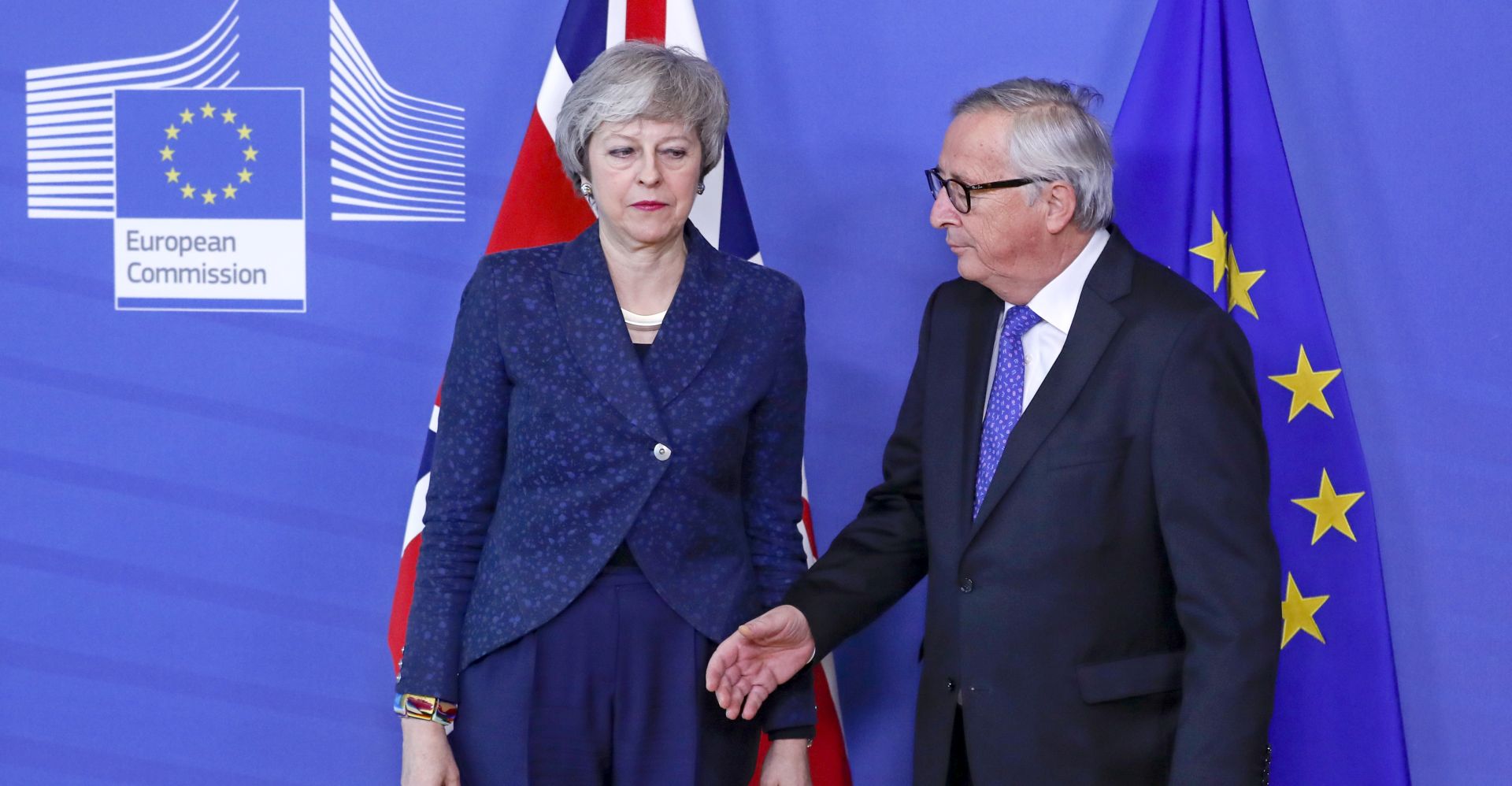 epa07349551 British Prime Minister Theresa May (L) is welcomed by European commission President Jean-Claude Juncker (R) ahead to a meeting on Brexit in Brussels, Belgium, 07 February 2019. May is in Brussels to discuss Brexit and related issues.  EPA/OLIVIER HOSLET