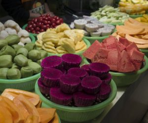 epa07357501 Cut fruits are on sale at a stall in a street food market in the Dongmen area of Shenzhen, Guangdong Province, China, 09 February 2019 (issued 10 February 2019). Dongmen is a shopping area and subdistrict within Luohu District and one of the oldest part of the city. The street food market is popular with locals and visitors alike.  EPA/STR