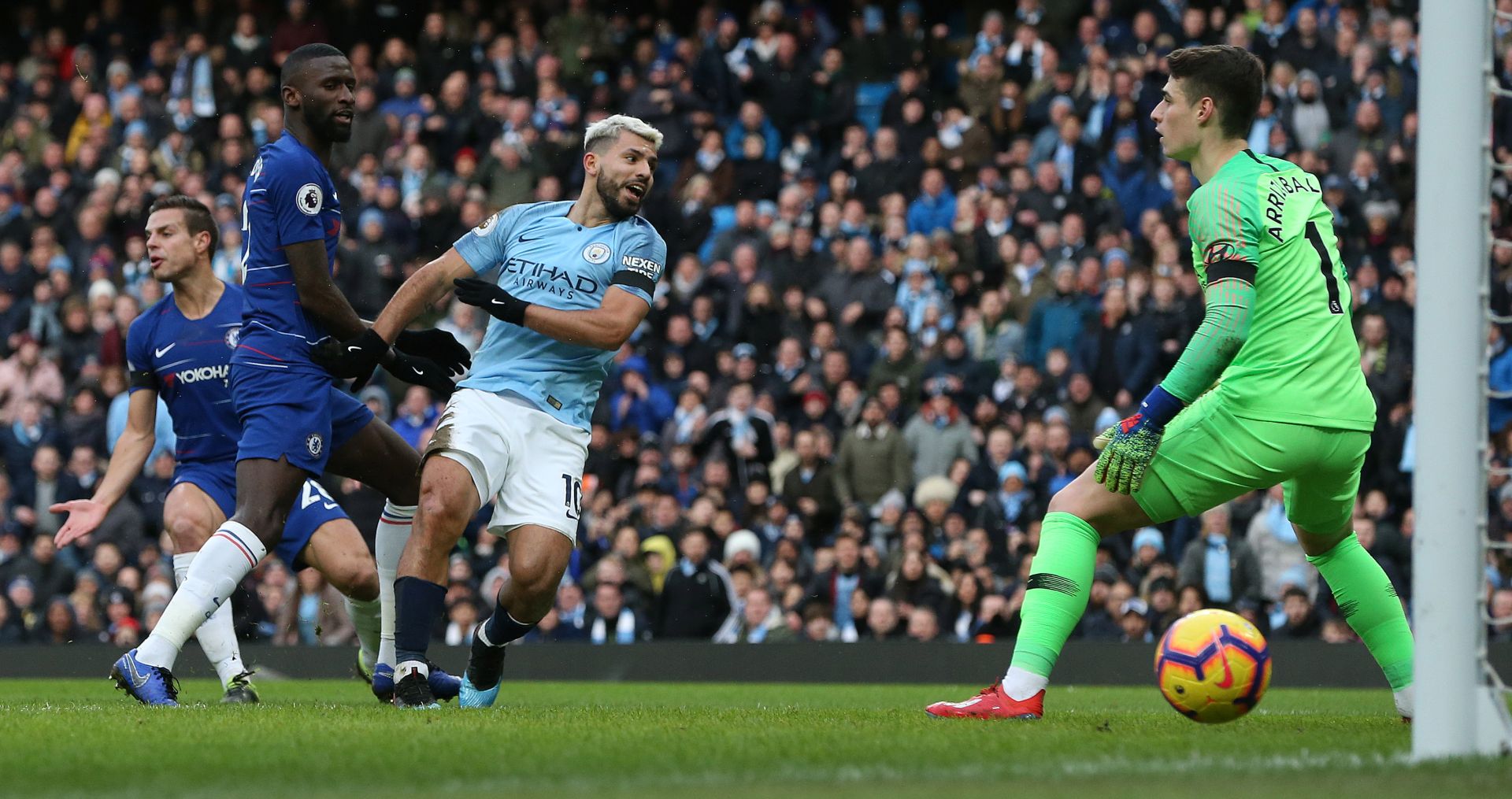 epa07359328 Manchester City's Sergio Aguero (3rdL) shoots to score his teams third goal during the English premier league soccer match between Manchester City and Chelsea at the Etihad Stadium in Manchester, Britain, 10 February 2019.  EPA/Nigel Roddis EDITORIAL USE ONLY. No use with unauthorized audio, video, data, fixture lists, club/league logos or 'live' services. Online in-match use limited to 120 images, no video emulation. No use in betting, games or single club/league/player publications.