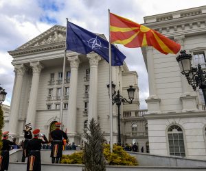 epa07364096 Members of a honor guard hoist the NATO flag alongside the Macedonian flag in front of the government building in Skopje, The Former Yugoslav Republic of Macedonia (FYROM), 12 February 2019. The former Yugoslav Republic of Macedonia's government is due to change the name of the country after the ratification of the 'Protocol of the North Atlantic Treaty for the Accession of North Macedonia' whereby Greece will approve the accession of its northern neighbor to NATO under its new name, as provided by the Prespes Agreement signed by Athens and Skopje.  EPA/GEORGI LICOVSKI