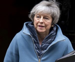 epa07364229 British Prime Minister Theresa May leaves Downing Street, central London, Britain, 12 February 2019. Theresa May is due to give a statement in the House of Commons later in the day to update Members of Parliament on Brexit talks.  EPA/WILL OLIVER