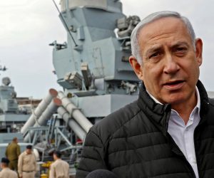 epa07364489 Israeli Prime Minister Benjamin Netanyahu speaks to journalists during a visit to inspect a naval Iron Dome defence system, designed to intercept and destroy incoming short-range rockets and artillery shells, installed on a Sa'ar 5 Lahav Class corvette of the Israeli Navy fleet, in the northern  port of Haifa, 12 February 2019.  EPA/JACK GUEZ / POOL